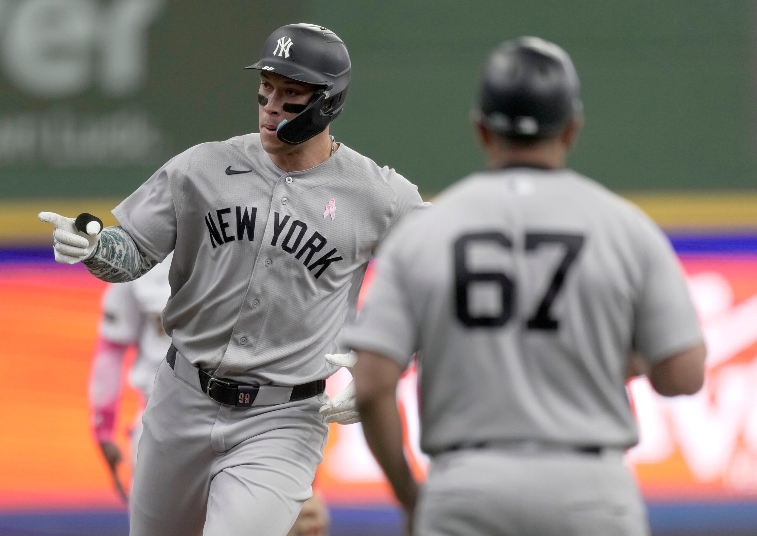 New York Yankees right fielder Aaron Judge (99) rounds third base after hitting a solo home run during the first inning of their game against the Milwaukee Brewers Sunday, May 10, 2026 at American Family Field in Milwaukee, Wisconsin.