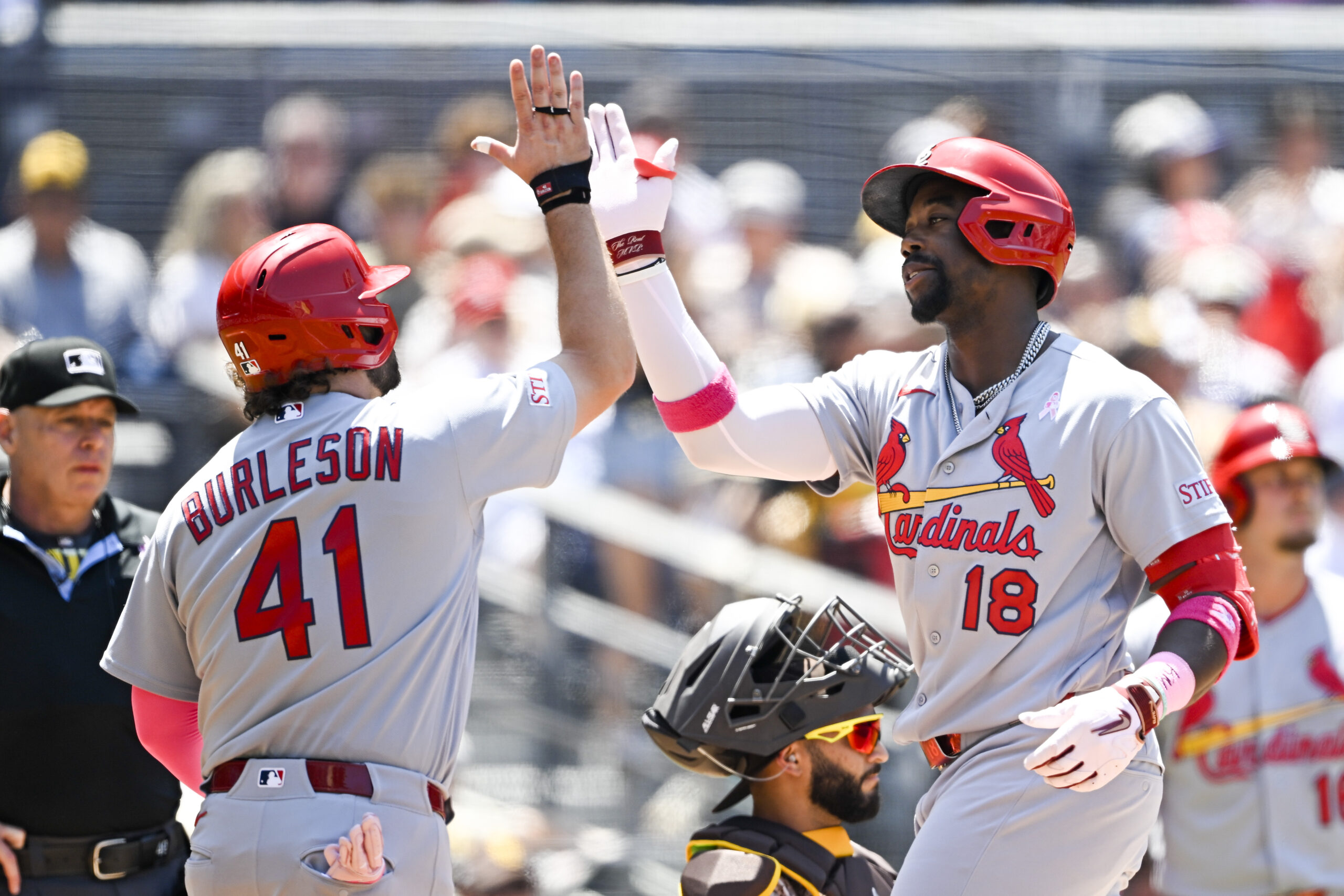 May 10, 2026; San Diego, California, USA; St. Louis Cardinals right fielder Jordan Walker (18) is congratulated by first baseman Alec Burleson (41) after hitting two-run home run during the fourth inning against the San Diego Padres at Petco Park. Mandatory Credit: Denis Poroy-Imagn Images
