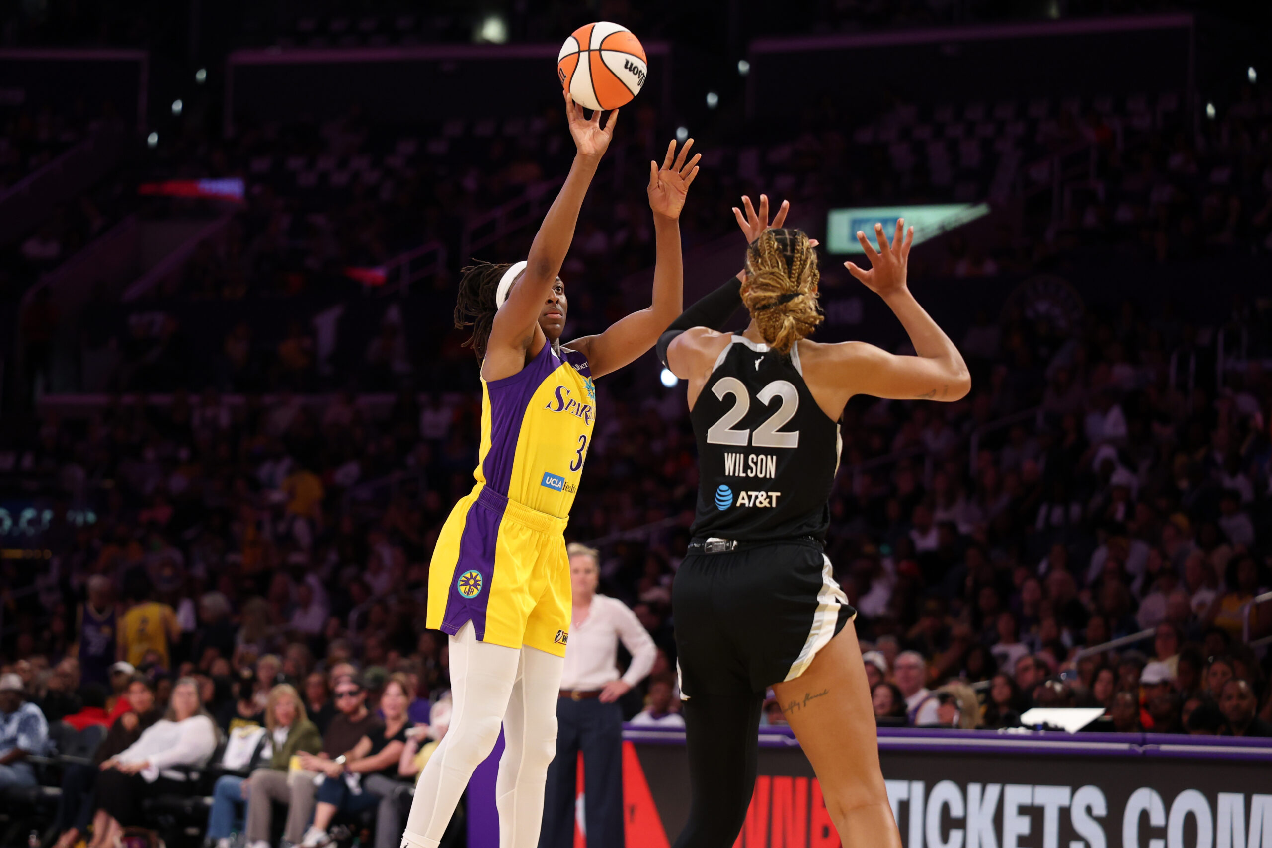 May 10, 2026; Los Angeles, California, USA;  Los Angeles Sparks forward Nneka Ogwumike (30) shoots the ball over Las Vegas Aces center A'ja Wilson (22) during the second quarter at Crypto.com Arena. Mandatory Credit: Kiyoshi Mio-Imagn Images