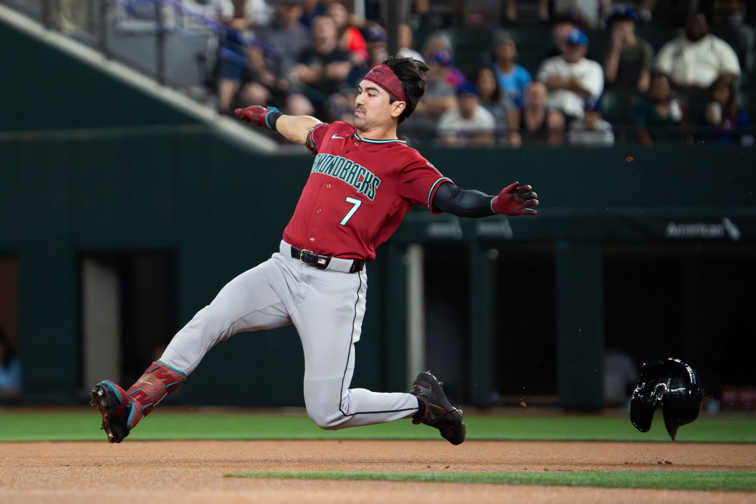 May 11, 2026; Arlington, Texas, USA;  Arizona Diamondbacks right fielder Corbin Carroll (7) slides into second base with a double against the Texas Rangers during the first inning at Globe Life Field. Mandatory Credit: Raymond Carlin III-Imagn Images