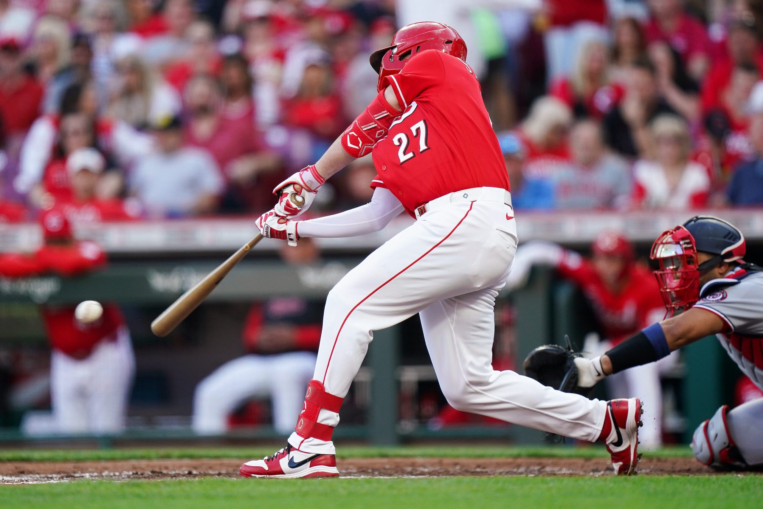 Cincinnati Reds designated hitter Sal Stewart (27) hits a single in the second inning of a MLB game between the Cincinnati Reds and Washington Nationals, Tuesday, May 12, 2026, at Great American Ball Park in downtown Cincinnati.