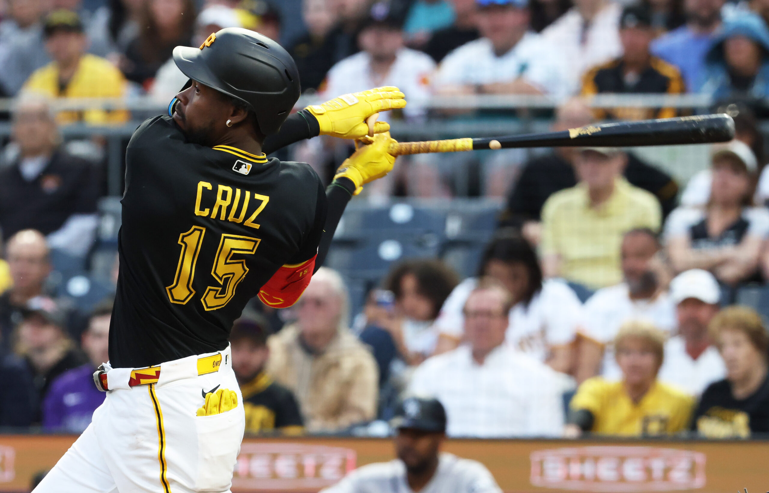 May 12, 2026; Pittsburgh, Pennsylvania, USA;  Pittsburgh Pirates center fielder Oneil Cruz (15) hits a double against the Colorado Rockies during the fifth inning at PNC Park. Mandatory Credit: Charles LeClaire-Imagn Images
