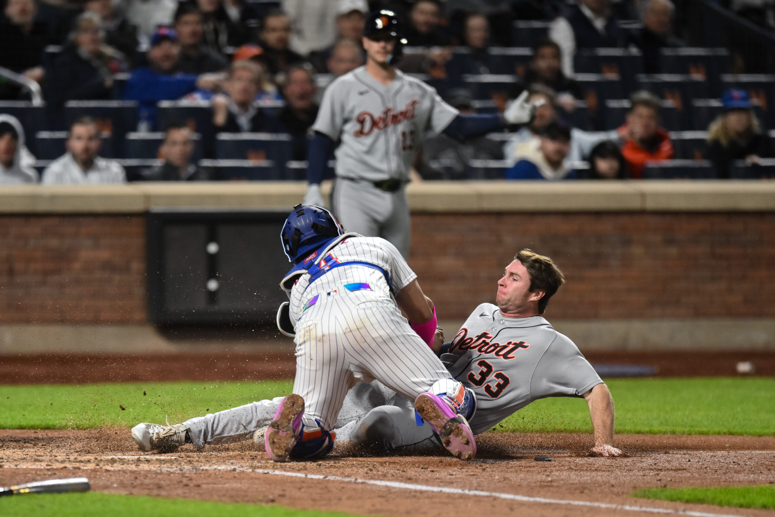 May 12, 2026; New York City, New York, USA; Detroit Tigers third baseman Colt Keith (33) is tagged out by New York Mets catcher Francisco Alvarez (4) while trying to score a run during the fifth inning at Citi Field. Mandatory Credit: John Jones-Imagn Images