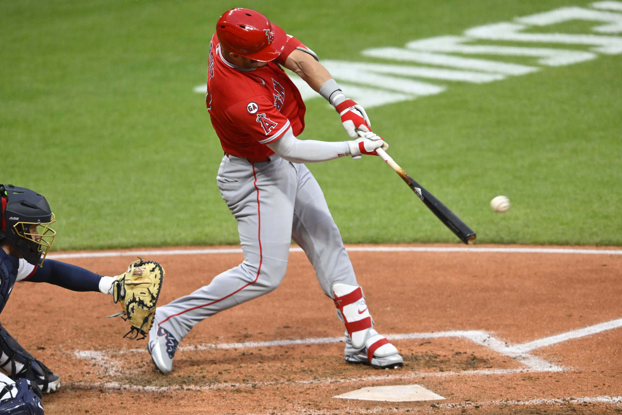 May 12, 2026; Cleveland, Ohio, USA; Los Angeles Angels center fielder Mike Trout (27) doubles in the fifth inning against the Cleveland Guardians at Progressive Field. Mandatory Credit: David Richard-Imagn Images