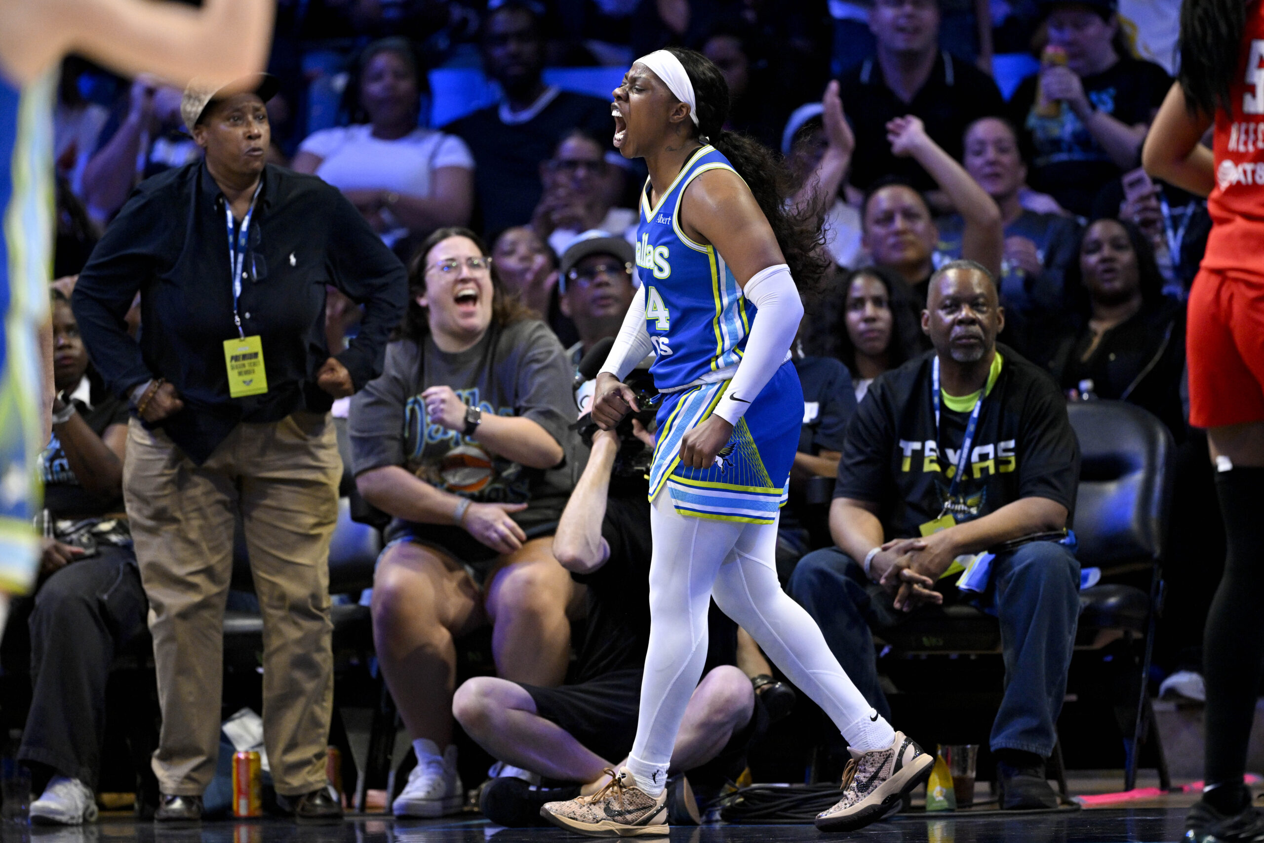 May 12, 2026; Arlington, Texas, USA; Dallas Wings guard Arike Ogunbowale (24) celebrates after making a basket against the Atlanta Dream during the second half at College Park Center. Mandatory Credit: Jerome Miron-Imagn Images
