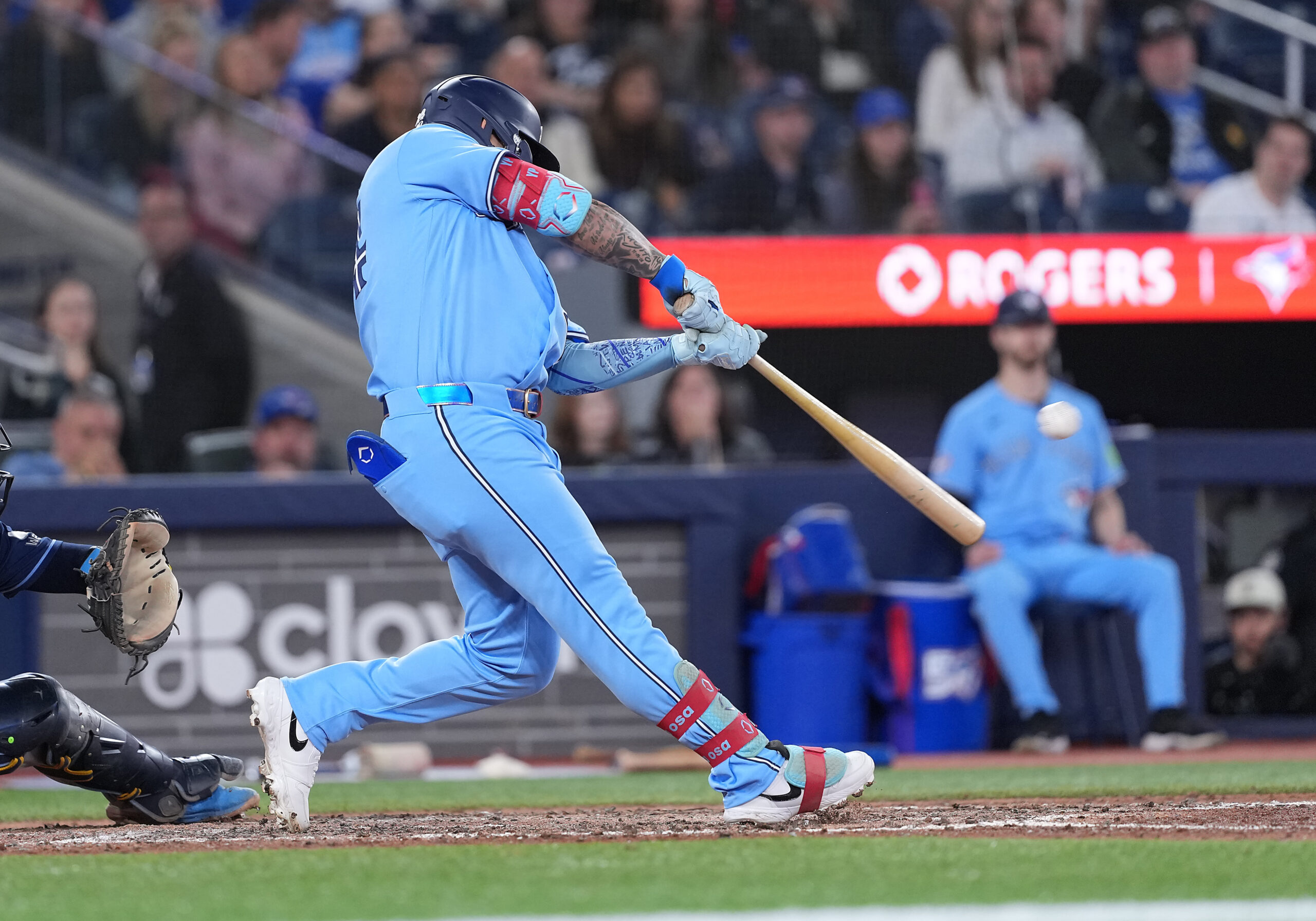 May 12, 2026; Toronto, Ontario, CAN; Toronto Blue Jays left fielder Yohendrick Pinango (24) hits a two run double against the Tampa Bay Rays during the seventh inning at Rogers Centre. Mandatory Credit: Nick Turchiaro-Imagn Images