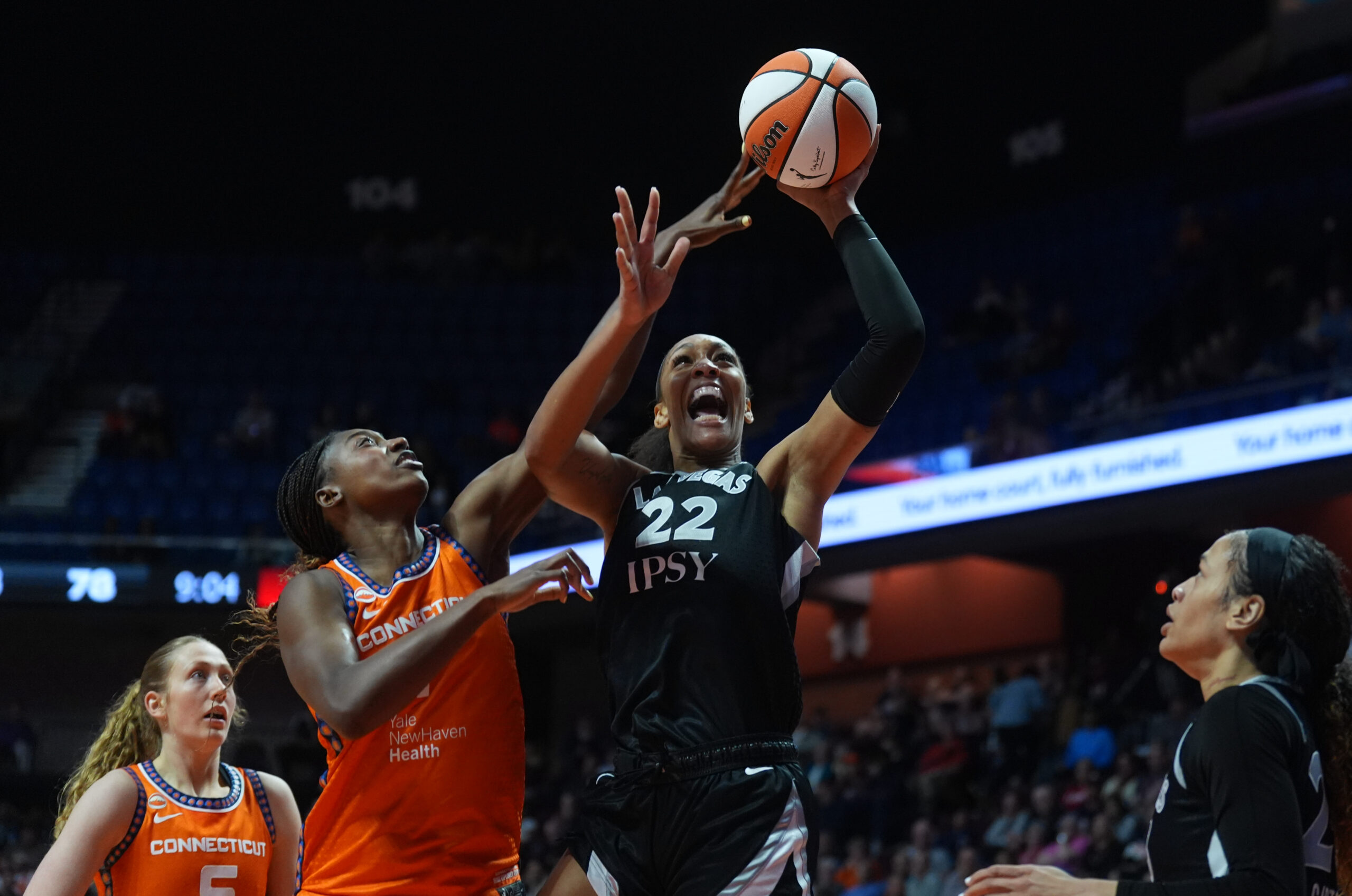 May 13, 2026; Uncasville, Connecticut, USA; Las Vegas Aces center A'ja Wilson (22) shoots the ball against Connecticut Sun forward Diamond Miller (1) in the second half at Mohegan Sun Arena. Mandatory Credit: David Butler II-Imagn Images