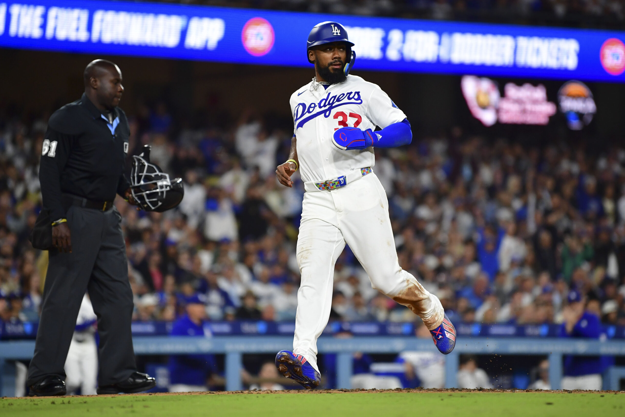 May 13, 2026; Los Angeles, California, USA; Los Angeles Dodgers left fielder Teoscar Hernández (37) scores in the fourth inning against the San Francisco Giants at Dodger Stadium. Mandatory Credit: Gary A. Vasquez-Imagn Images