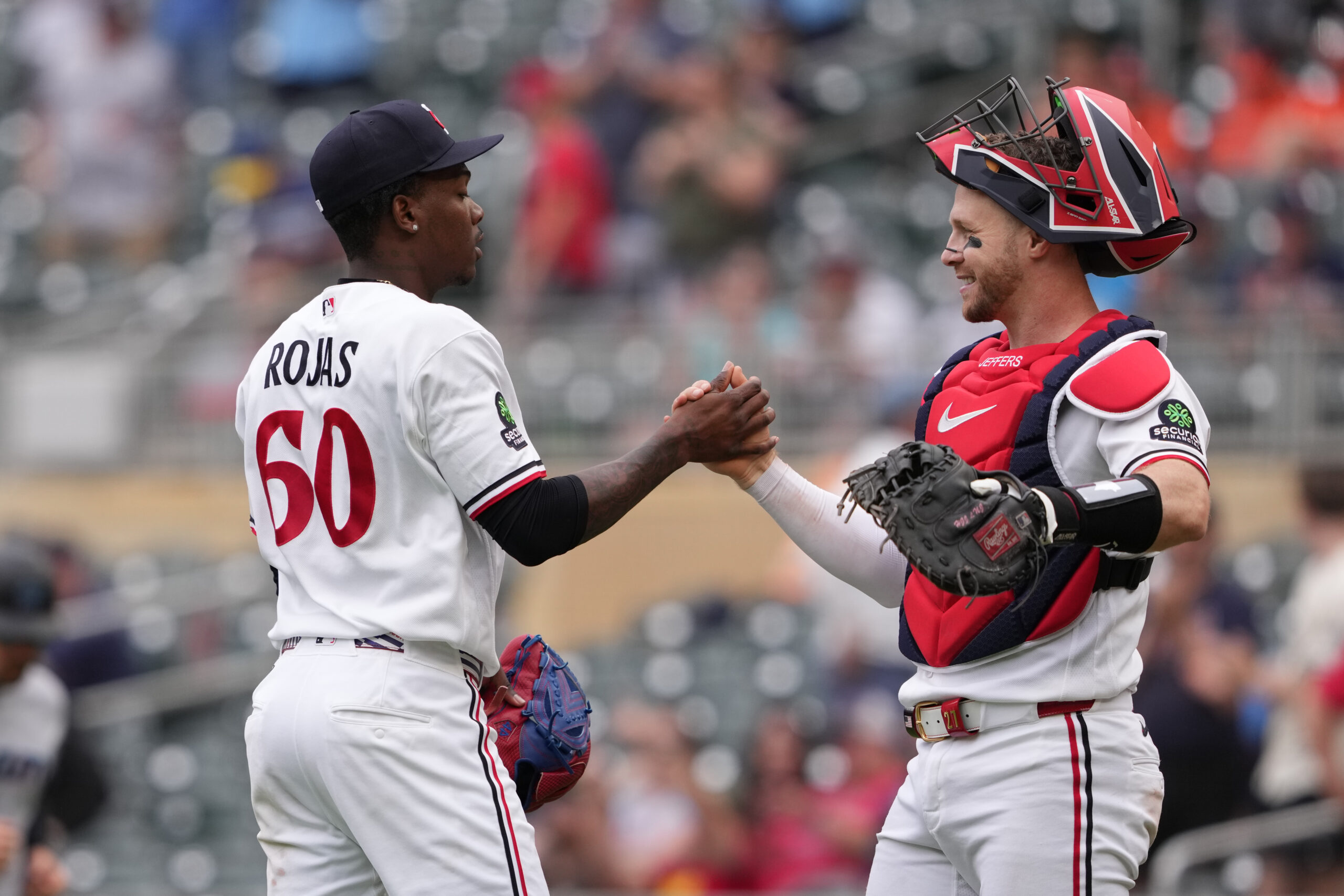 May 14, 2026; Minneapolis, Minnesota, USA; Minnesota Twins pitcher Kendry Rojas (60) and catcher Ryan Jeffers (27) celebrate after defeating the Miami Marlins at Target Field. Mandatory Credit: Jordan Johnson-Imagn Images