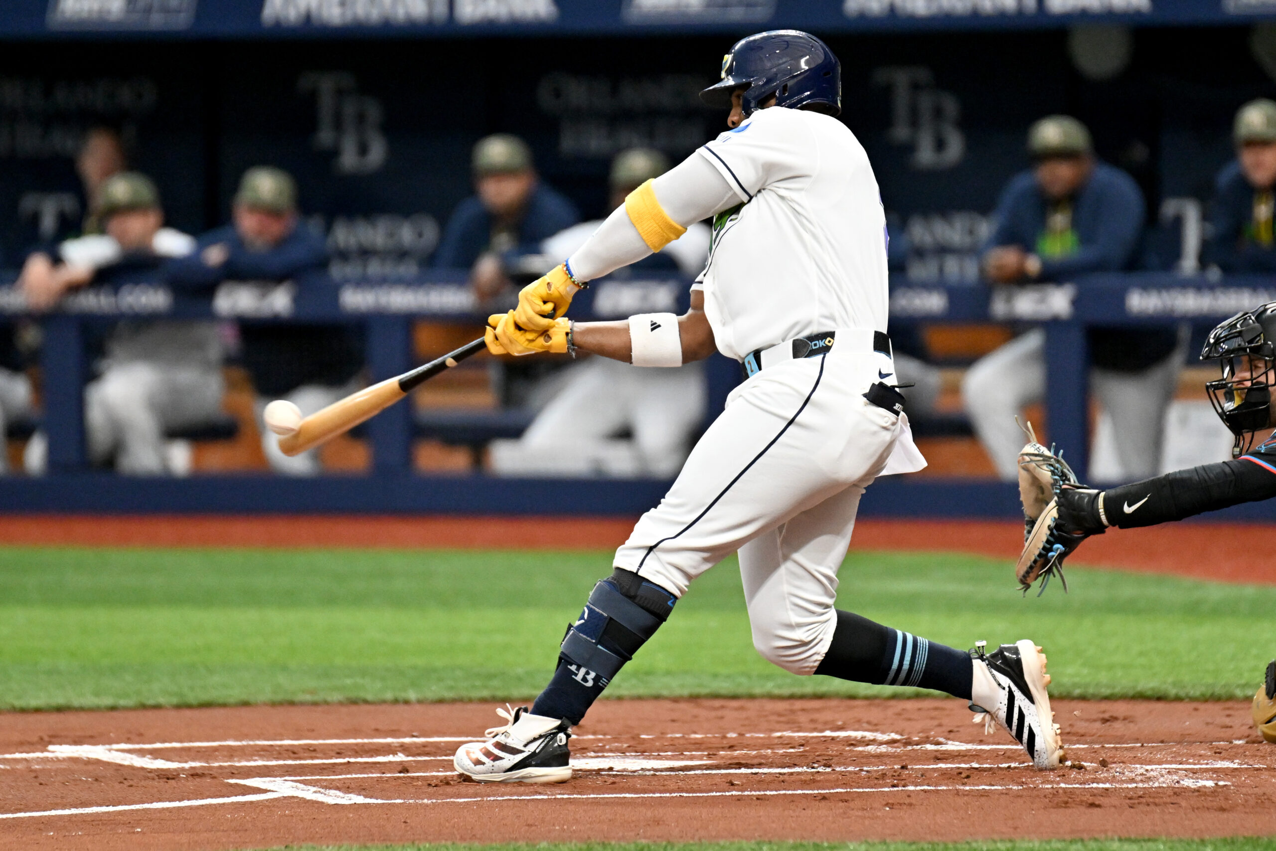 May 15, 2026; St. Petersburg, Florida, USA; Tampa Bay Rays designated hitter Yandy Diaz (2) hits a two run home run in the second inning against the Miami Marlins at Tropicana Field. Mandatory Credit: Jonathan Dyer-Imagn Images