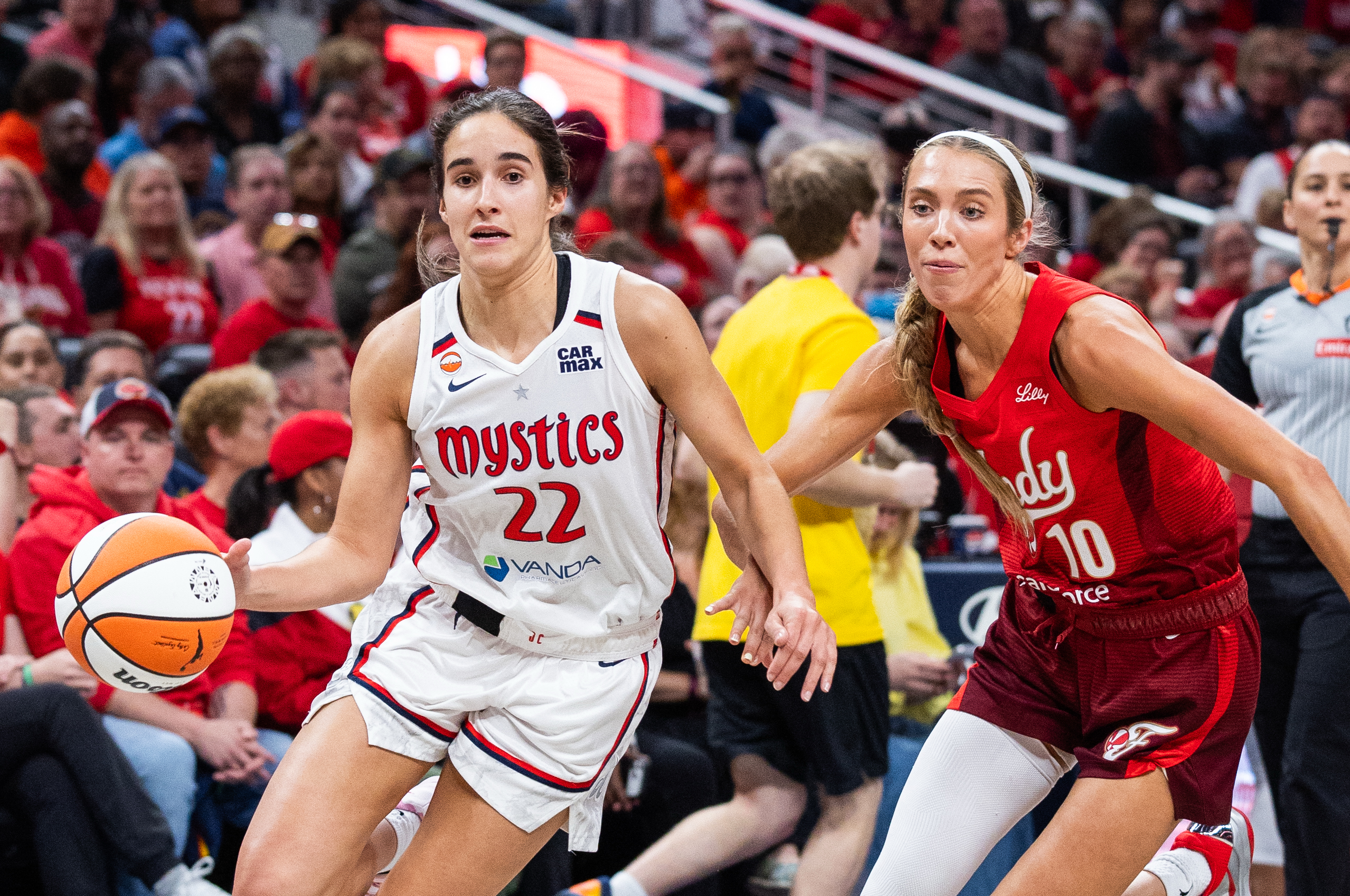 May 15, 2026; Indianapolis, Indiana, USA; Washington Mystics guard Sonia Citron (22) dribbles the ball while Indiana Fever guard Lexie Hull (10) defends in the first half at Gainbridge Fieldhouse. Mandatory Credit: Trevor Ruszkowski-Imagn Images