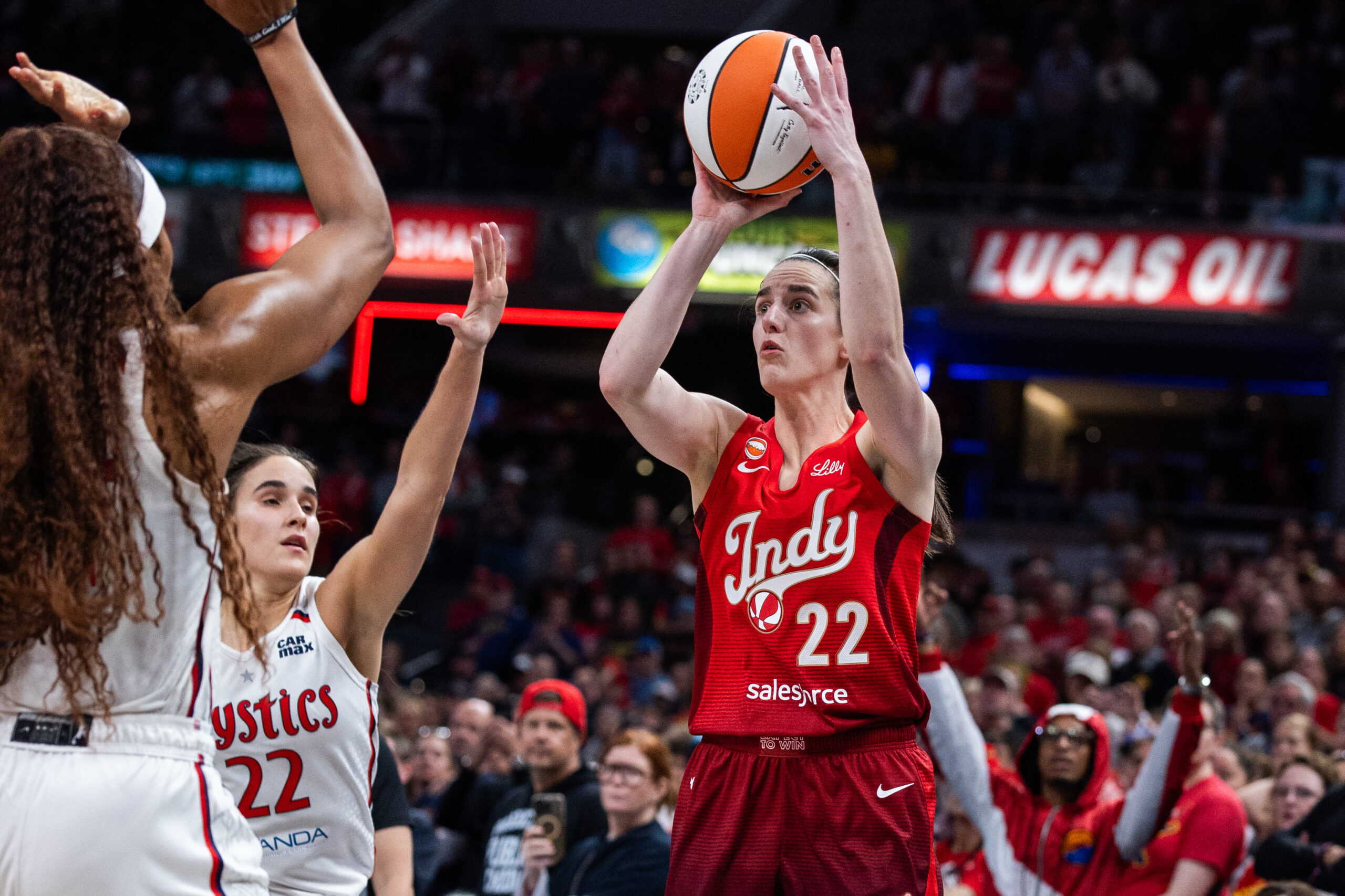 May 15, 2026; Indianapolis, Indiana, USA; Indiana Fever guard Caitlin Clark (22) shoots the ball while Washington Mystics guard Sonia Citron (22) defends in the second half at Gainbridge Fieldhouse. Mandatory Credit: Trevor Ruszkowski-Imagn Images