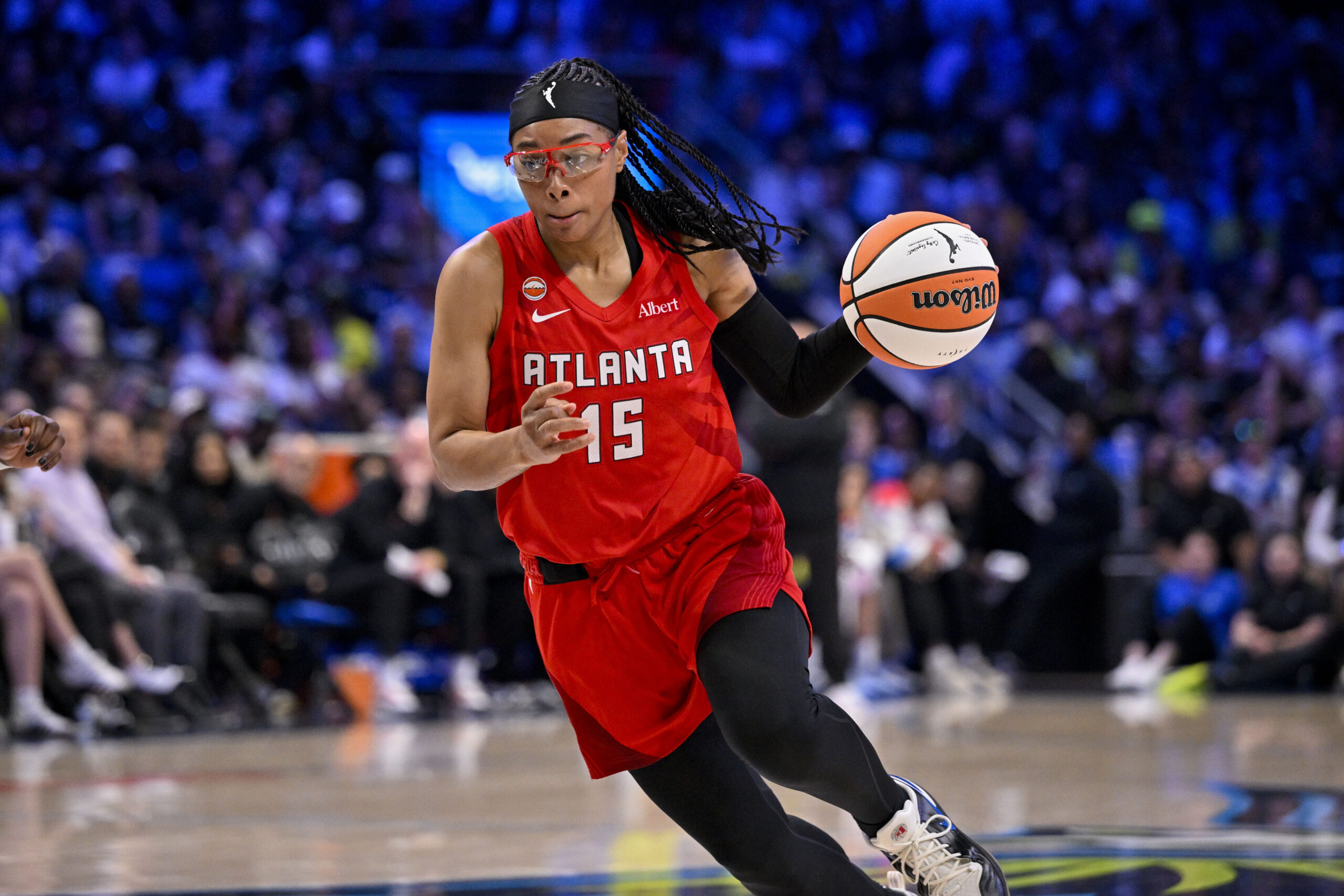 May 12, 2026; Arlington, Texas, USA; Atlanta Dream guard Allisha Gray (15) controls the ball during the game between the Wings and the Dream at College Park Center. Mandatory Credit: Jerome Miron-Imagn Images