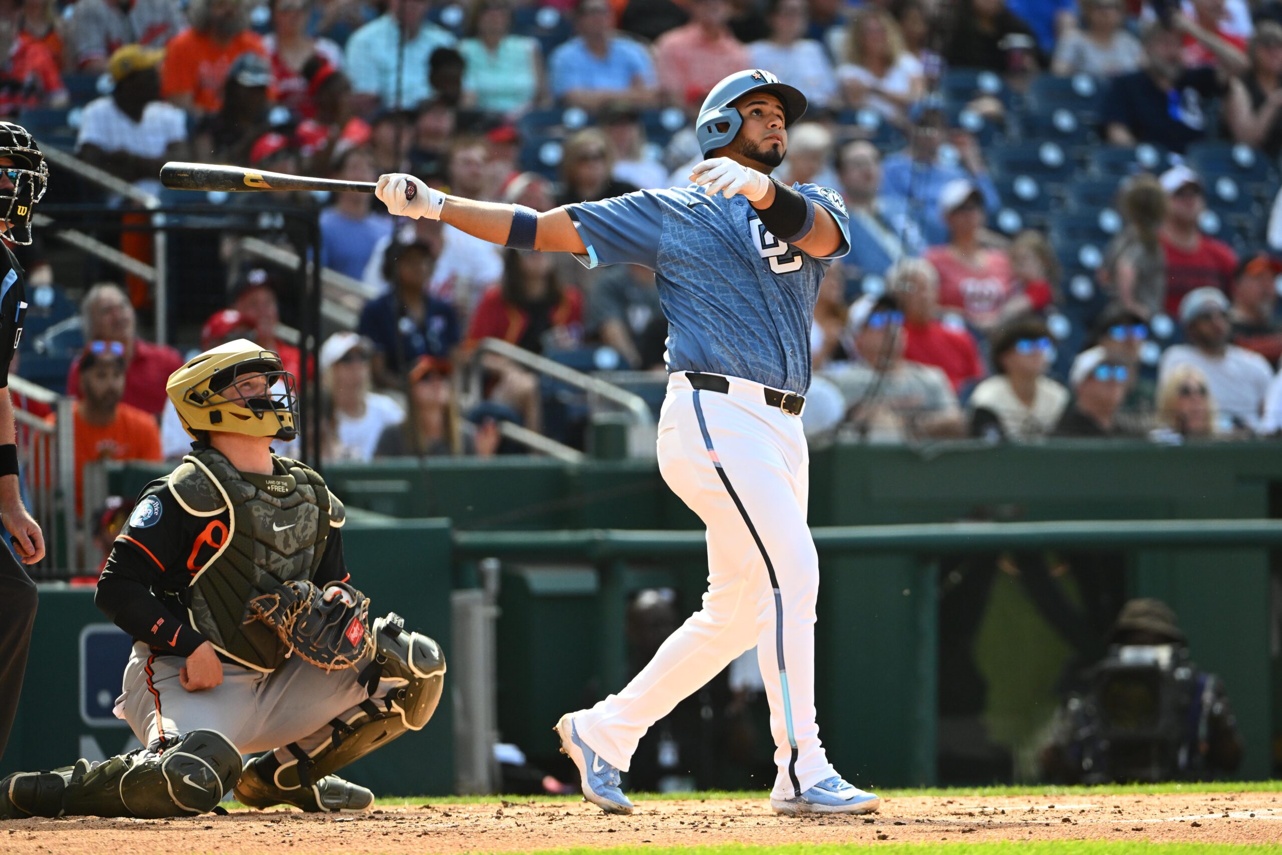 May 16, 2026; Washington, District of Columbia, USA; Washington Nationals catcher Keibert Ruiz (20) hits a three run home run against the Baltimore Orioles during the second inning at Nationals Park. Mandatory Credit: Brad Mills-Imagn Images