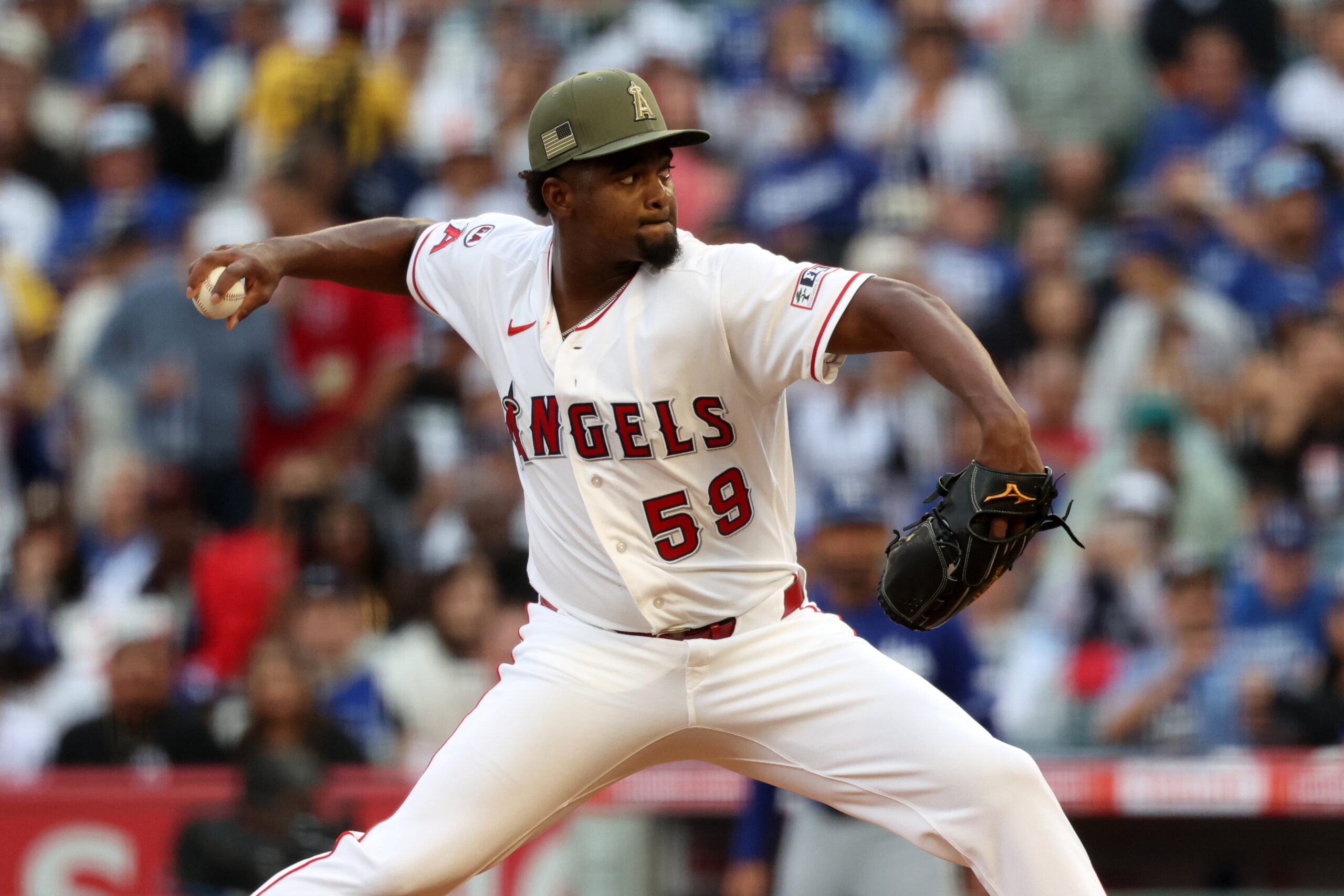 May 16, 2026; Anaheim, California, USA;  Los Angeles Angels pitcher Jose Soriano (59) pitches during the first inning against the Los Angeles Dodgers at Angel Stadium. Mandatory Credit: Kiyoshi Mio-Imagn Images