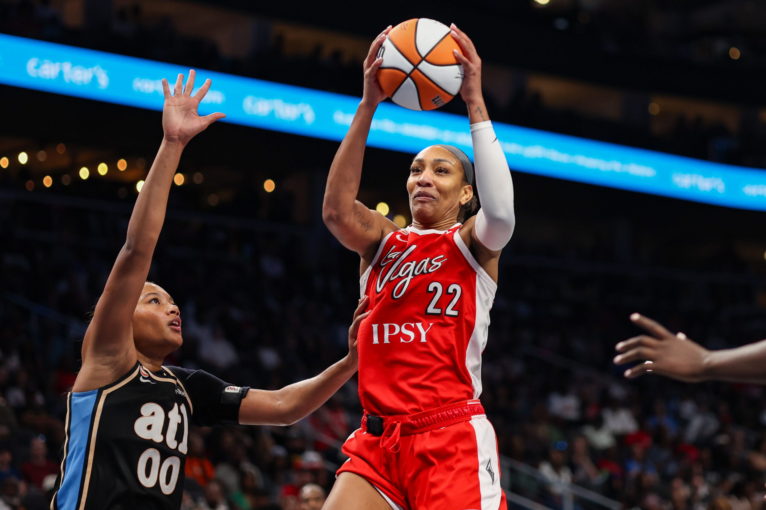 May 17, 2026; Atlanta, Georgia, USA; Las Vegas Aces center A'ja Wilson (22) grabs a rebound against the Atlanta Dream in the second quarter at State Farm Arena. Mandatory Credit: Brett Davis-Imagn Images
