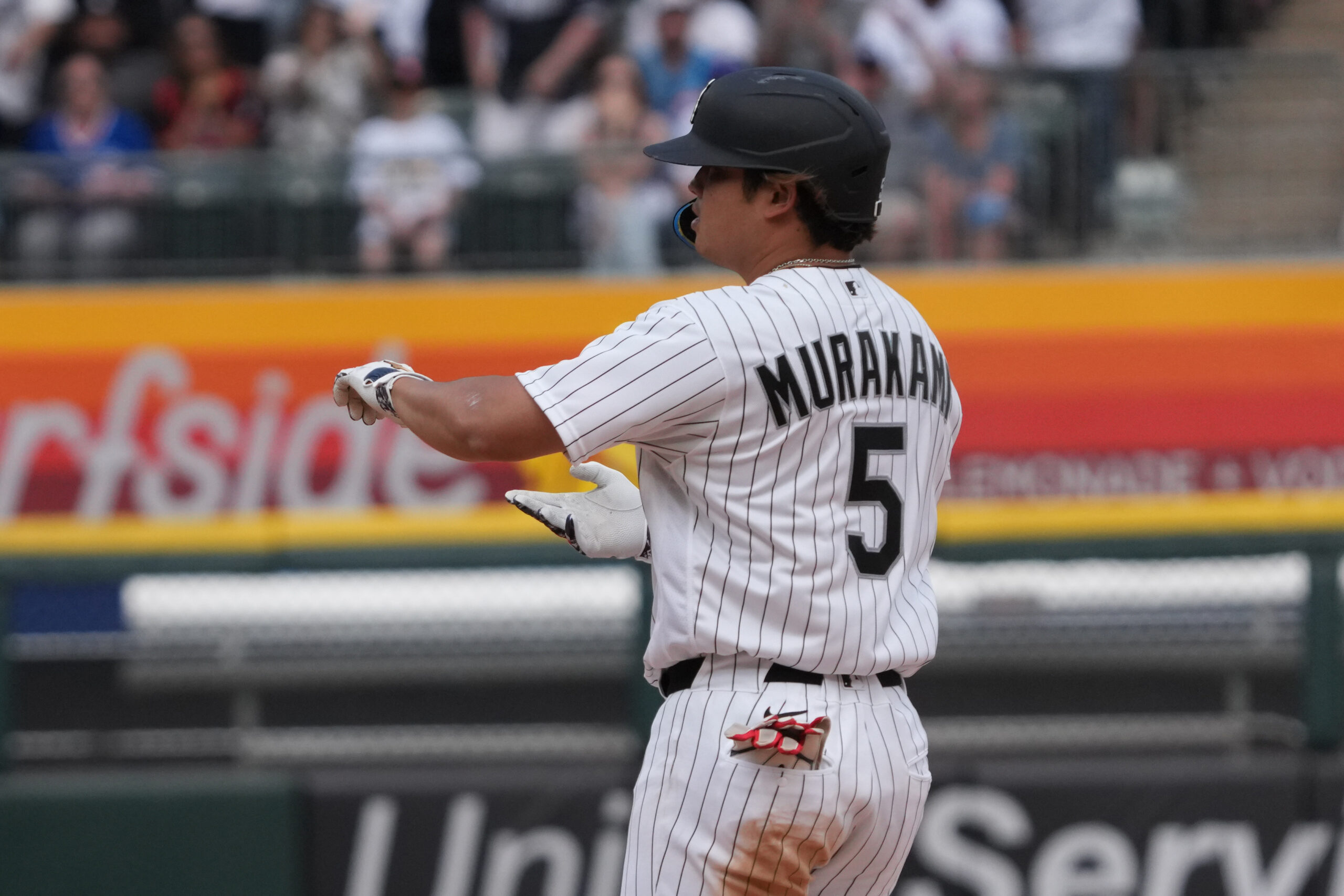 May 17, 2026; Chicago, Illinois, USA; Chicago White Sox first baseman Munetaka Murakami (5) gestures after hitting a double against the Chicago Cubs during the ninth inning at Rate Field. Mandatory Credit: David Banks-Imagn Images