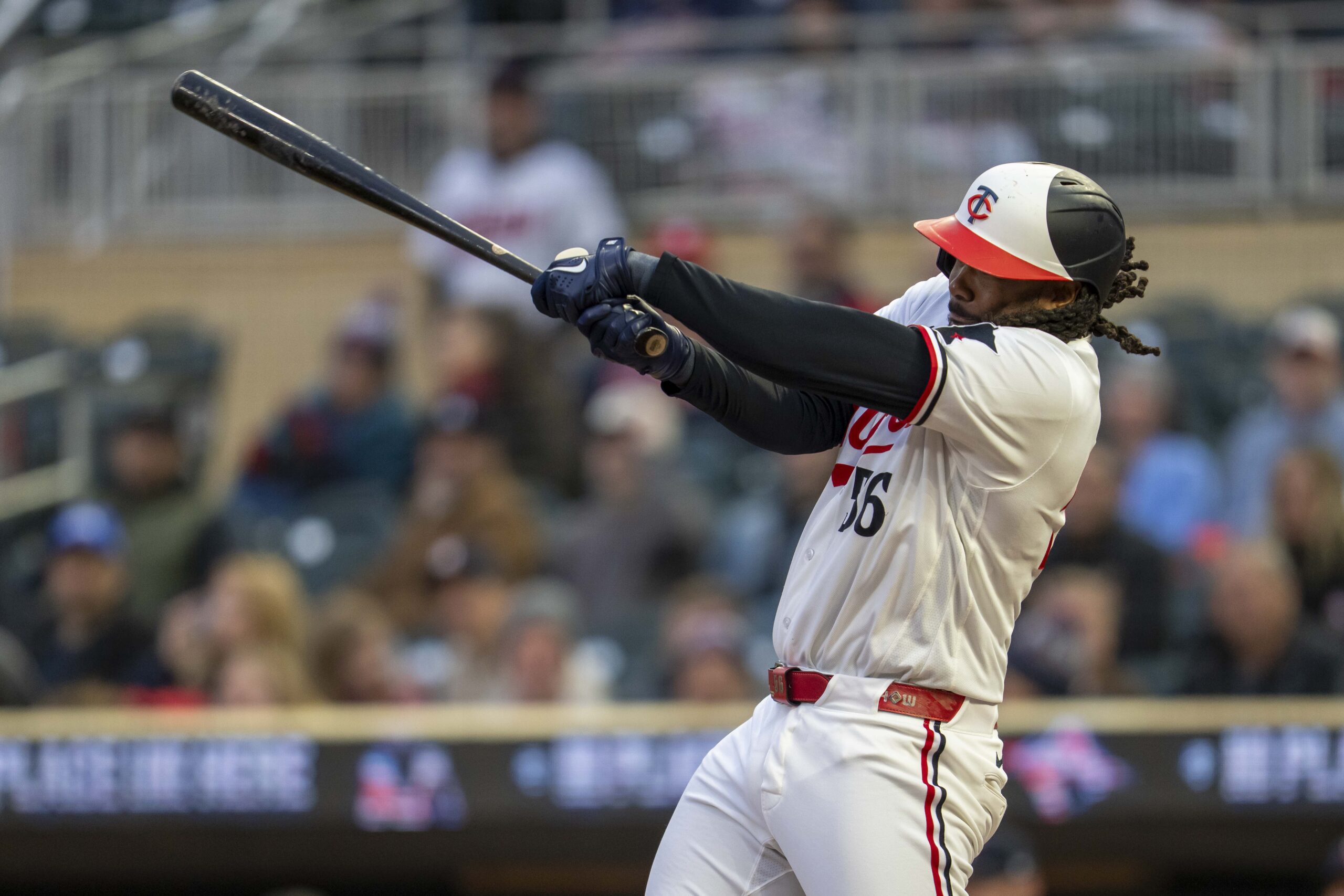 May 19, 2026; Minneapolis, Minnesota, USA; Minnesota Twins first baseman Josh Bell (56) hits a single against the Houston Astros in the sixth inning at Target Field. Mandatory Credit: Jesse Johnson-Imagn Images