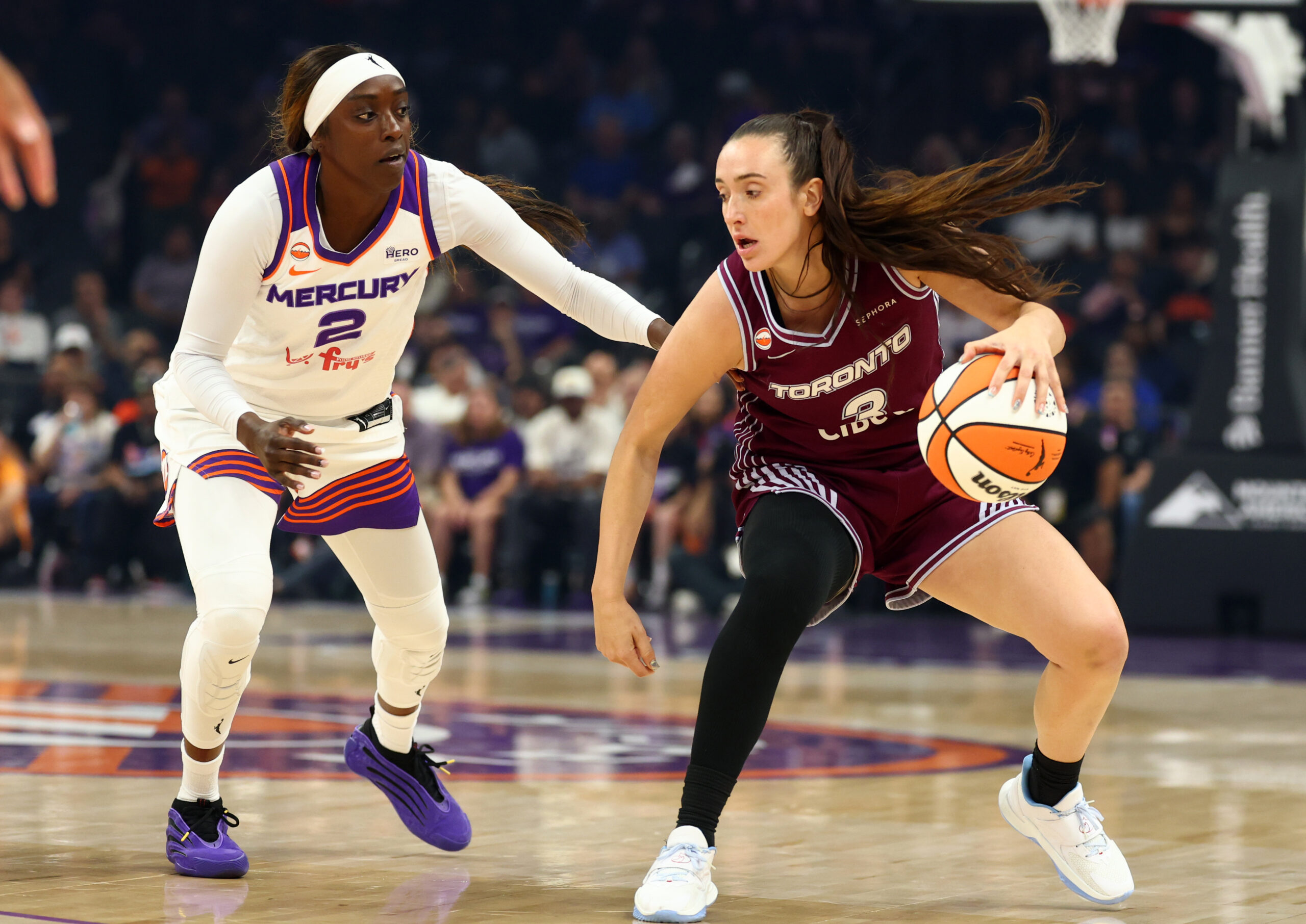 May 19, 2026; Phoenix, Arizona, USA; Phoenix Mercury guard Kahleah Copper (2) defends against Toronto Tempo guard Marina Mabrey (3) in the first half at Mortgage Matchup Center. Mandatory Credit: Mark J. Rebilas-Imagn Images