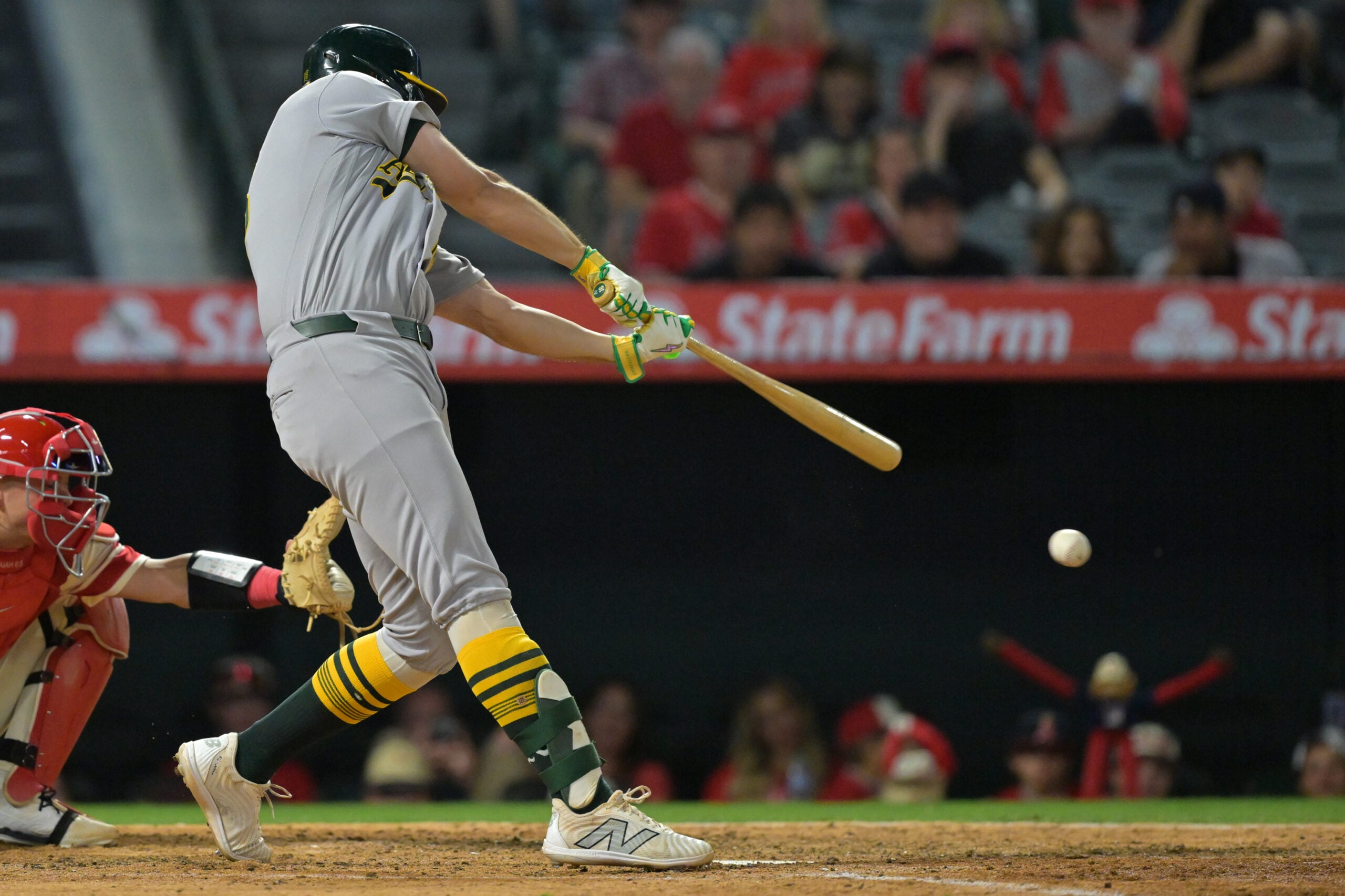 May 19, 2026; Anaheim, California, USA;  Athletics first baseman Nick Kurtz (16) singles in two runs in the sixth inning against the Los Angeles Angels at Angel Stadium. Mandatory Credit: Jayne Kamin-Oncea-Imagn Images