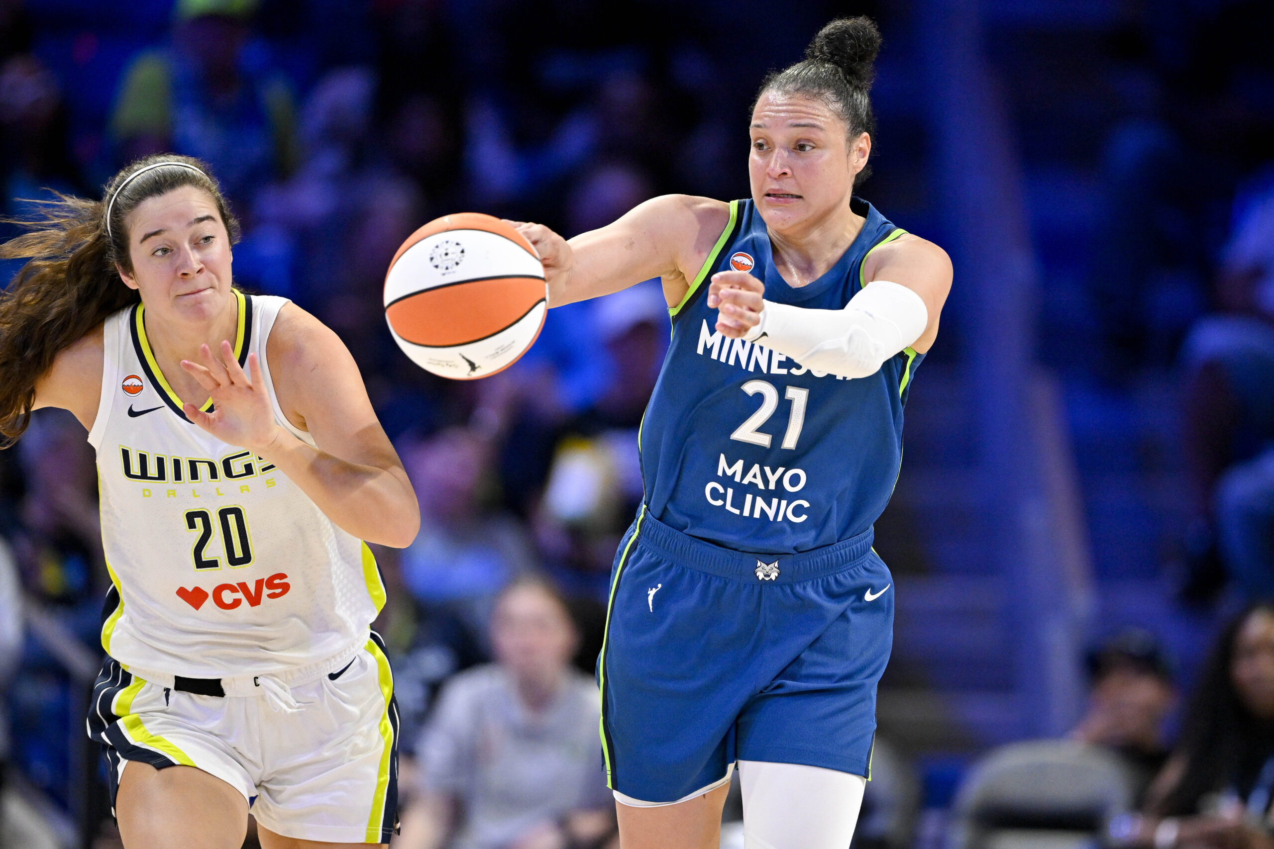 May 14, 2026; Arlington, Texas, USA; Minnesota Lynx guard Kayla McBride (21) passes the ball during the game between the Wings and the Lynx at College Park Center. Mandatory Credit: Jerome Miron-Imagn Images