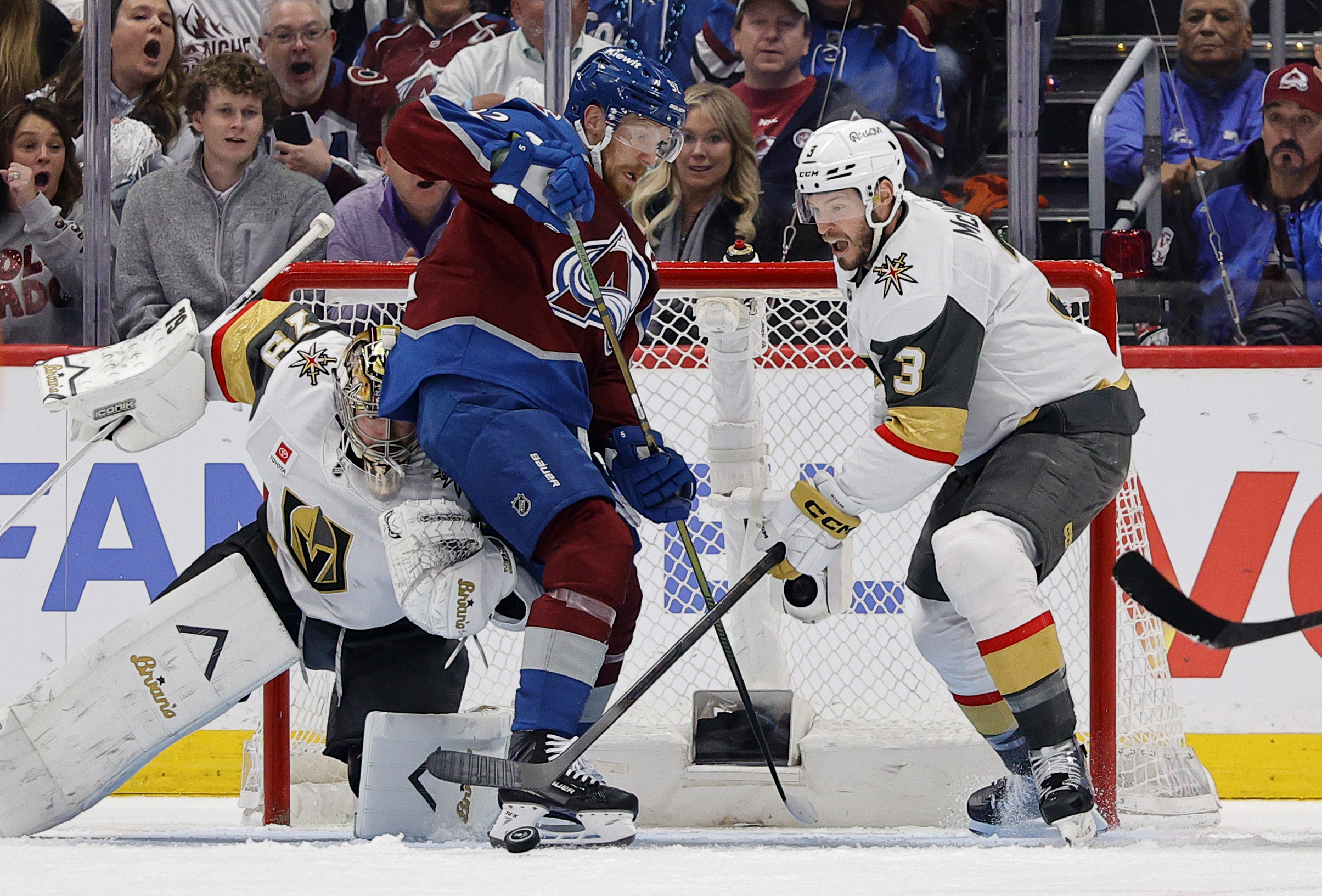 May 20, 2026; Denver, Colorado, USA; Vegas Golden Knights goaltender Carter Hart (79) and defenseman Brayden McNabb (3) defend Colorado Avalanche left wing Gabriel Landeskog (92) during the first period in game one of the Western Conference Final of the 2026 Stanley Cup Playoffs at Ball Arena. Mandatory Credit: Isaiah J. Downing-Imagn Images