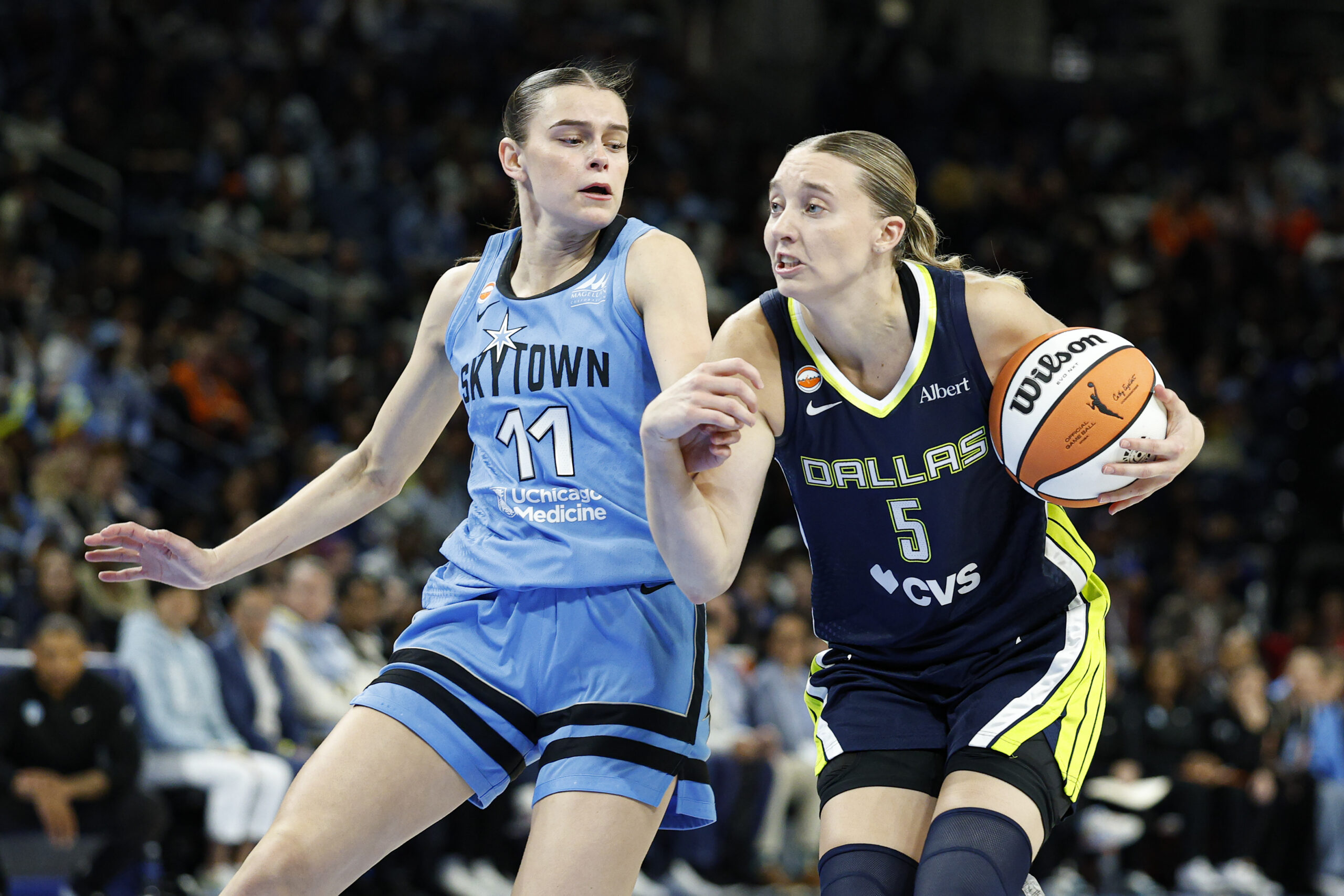 May 20, 2026; Chicago, Illinois, USA; Dallas Wings guard Paige Bueckers (5) drives to the basket against Chicago Sky guard Gabriela Jaquez (11) during the second half at Wintrust Arena. Mandatory Credit: Kamil Krzaczynski-Imagn Images