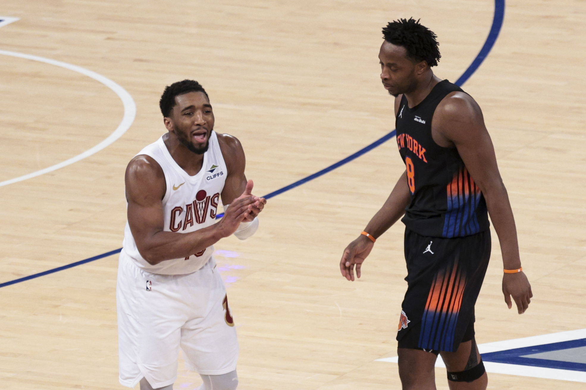 May 21, 2026; New York, New York, USA; Cleveland Cavaliers guard Donovan Mitchell (45) reacts after being called for a foul as New York Knicks forward Og Anunoby (8) looks on during the fourth quarter of game two of the eastern conference finals of the 2026 NBA playoffs at Madison Square Garden. Mandatory Credit: Vincent Carchietta-Imagn Images