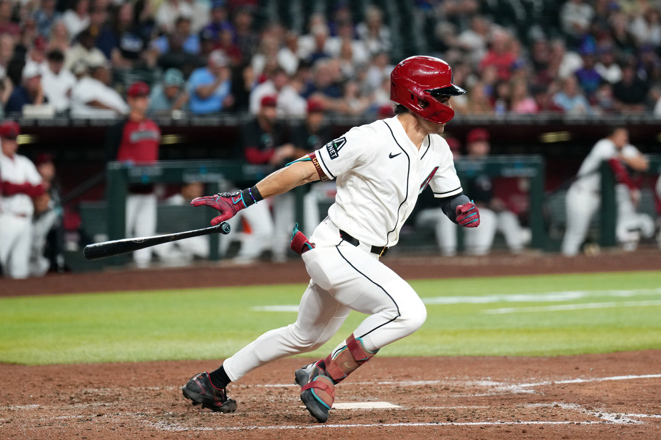 May 21, 2026; Phoenix, Arizona, USA; Arizona Diamondbacks right fielder Corbin Carroll (7) hits an RBI ground out against the Colorado Rockies during the sixth inning at Chase Field. Mandatory Credit: Joe Camporeale-Imagn Images
