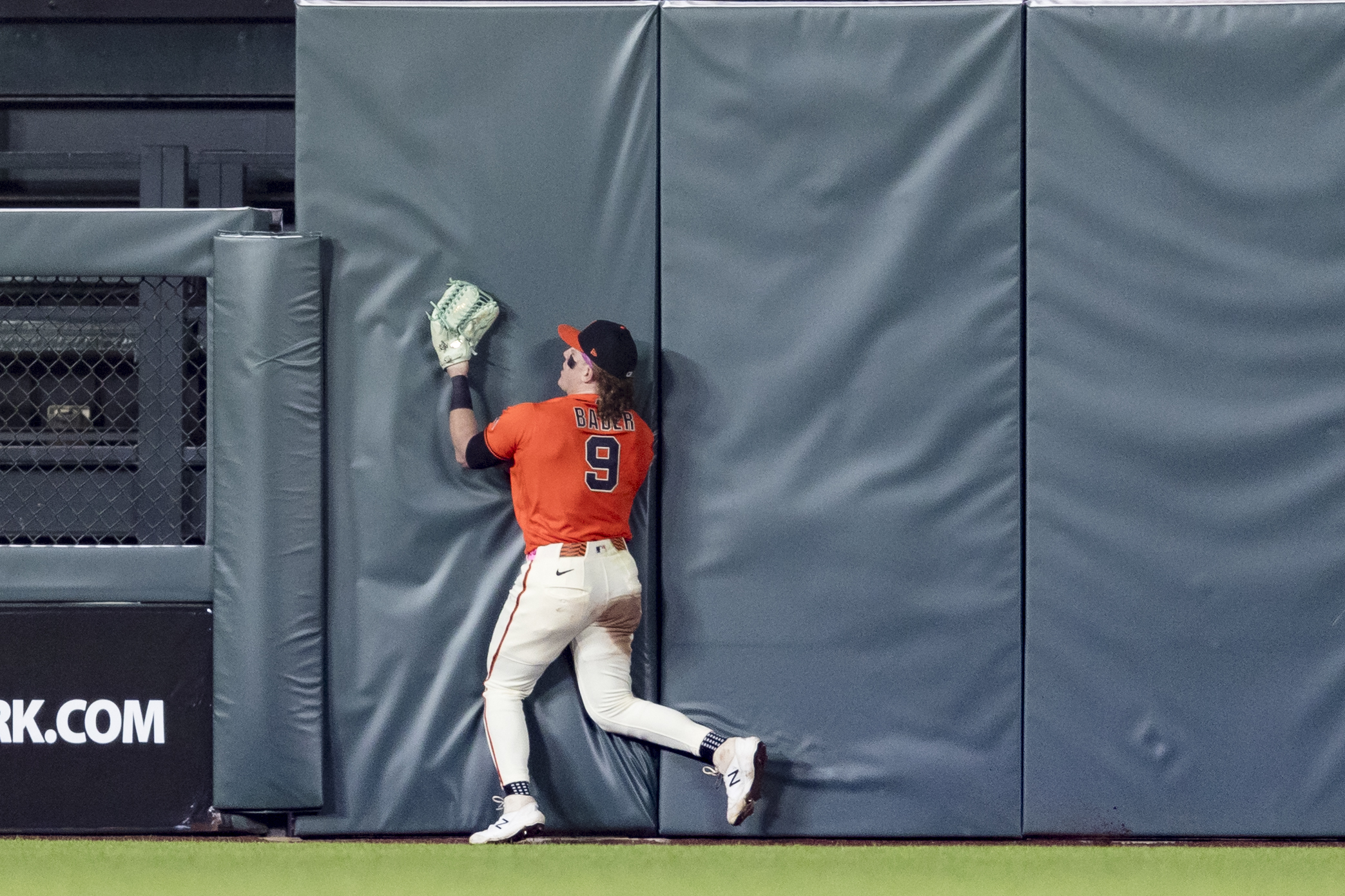 May 22, 2026; San Francisco, California, USA; San Francisco Giants center fielder Harrison Bader (9) hits the wall after catching a deep fly ball against the Chicago White Sox  during the ninth inning at Oracle Park. Mandatory Credit: John Hefti-Imagn Images