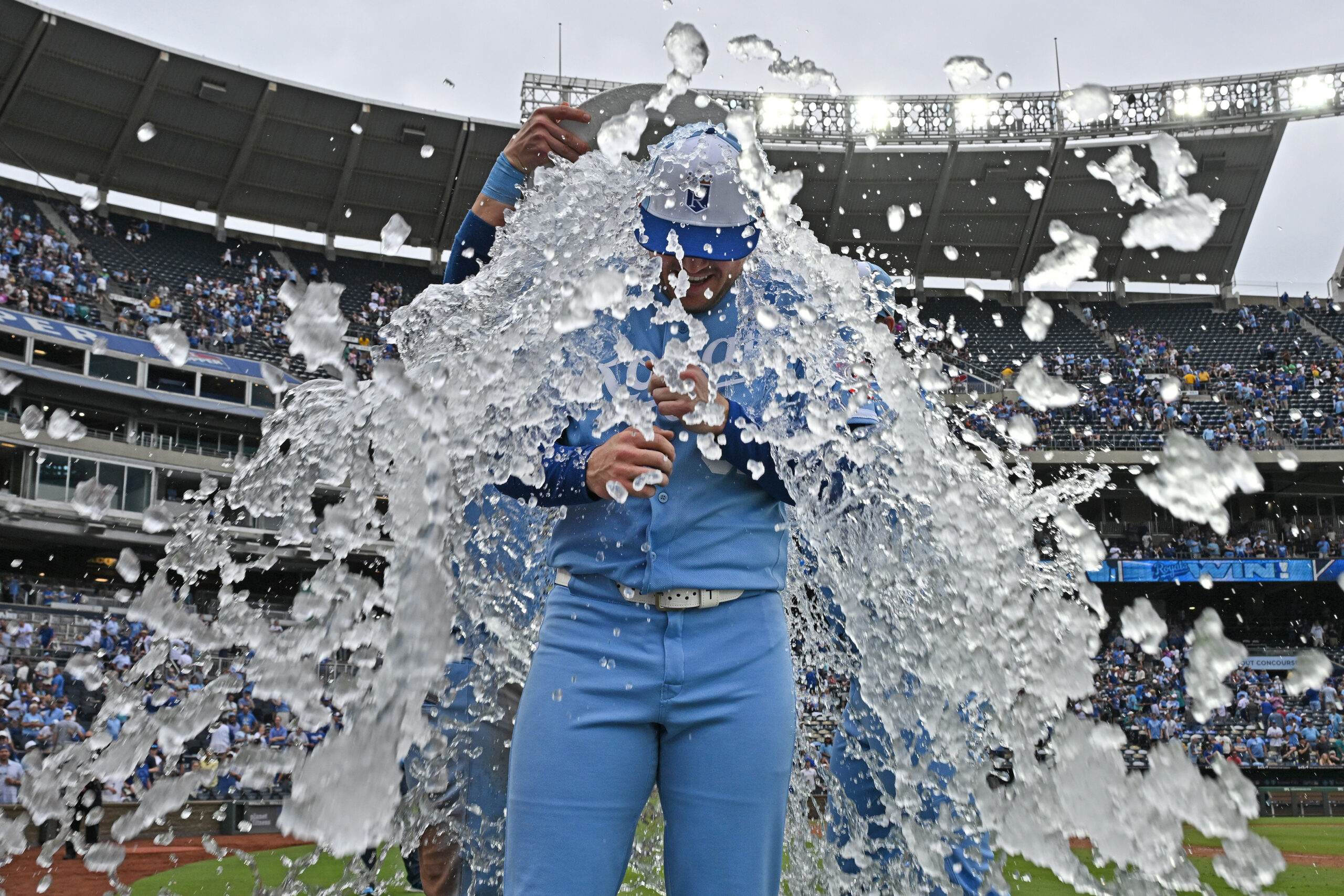 May 23, 2026; Kansas City, Missouri, USA;  Kansas City Royals starting pitcher Stephen Kolek (32) gets dunked with ice water after throwing a complete game shutout to beat the Seattle Mariners at Kauffman Stadium. Mandatory Credit: Peter Aiken-Imagn Images
