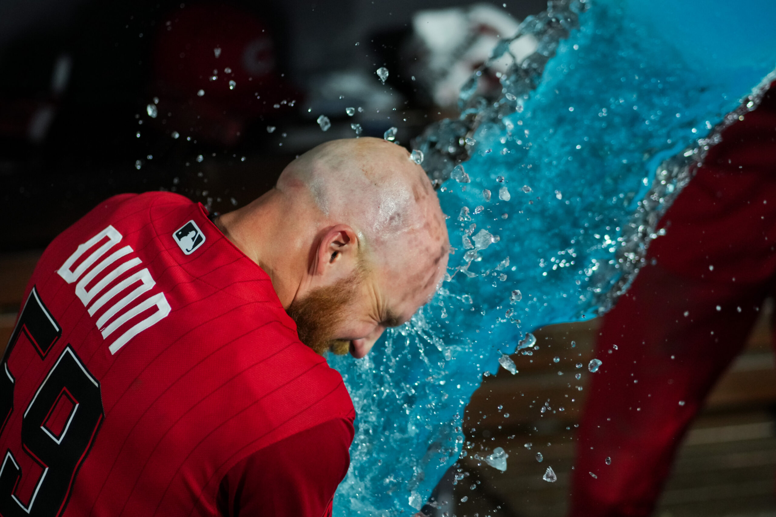 May 23, 2026; Cincinnati, Ohio, USA;  Cincinnati Reds outfielder Blake Dunn is doused with Powerade by shortstop Elly de la Cruz after defeating the St. Louis Cardinals at Great American Ball Park. Mandatory Credit: Aaron Doster-Imagn Images