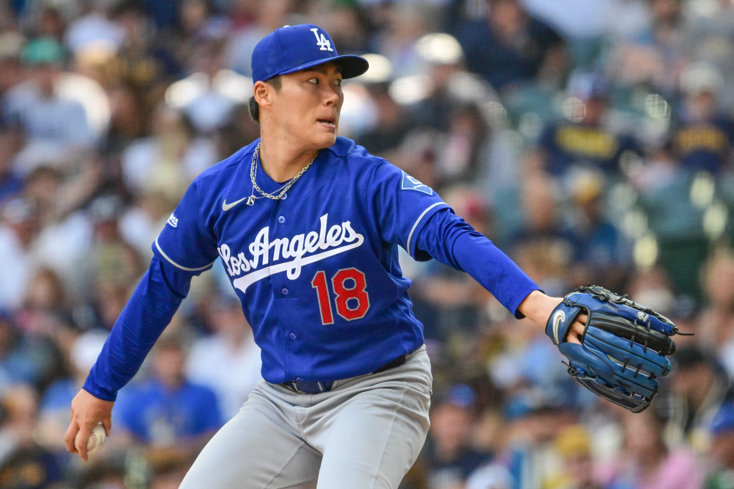 May 24, 2026; Milwaukee, Wisconsin, USA; Los Angeles Dodgers starting pitcher Yoshinobu Yamamoto (18) throws a pitch in the sixth inning against the Milwaukee Brewers at American Family Field. Mandatory Credit: Benny Sieu-Imagn Images