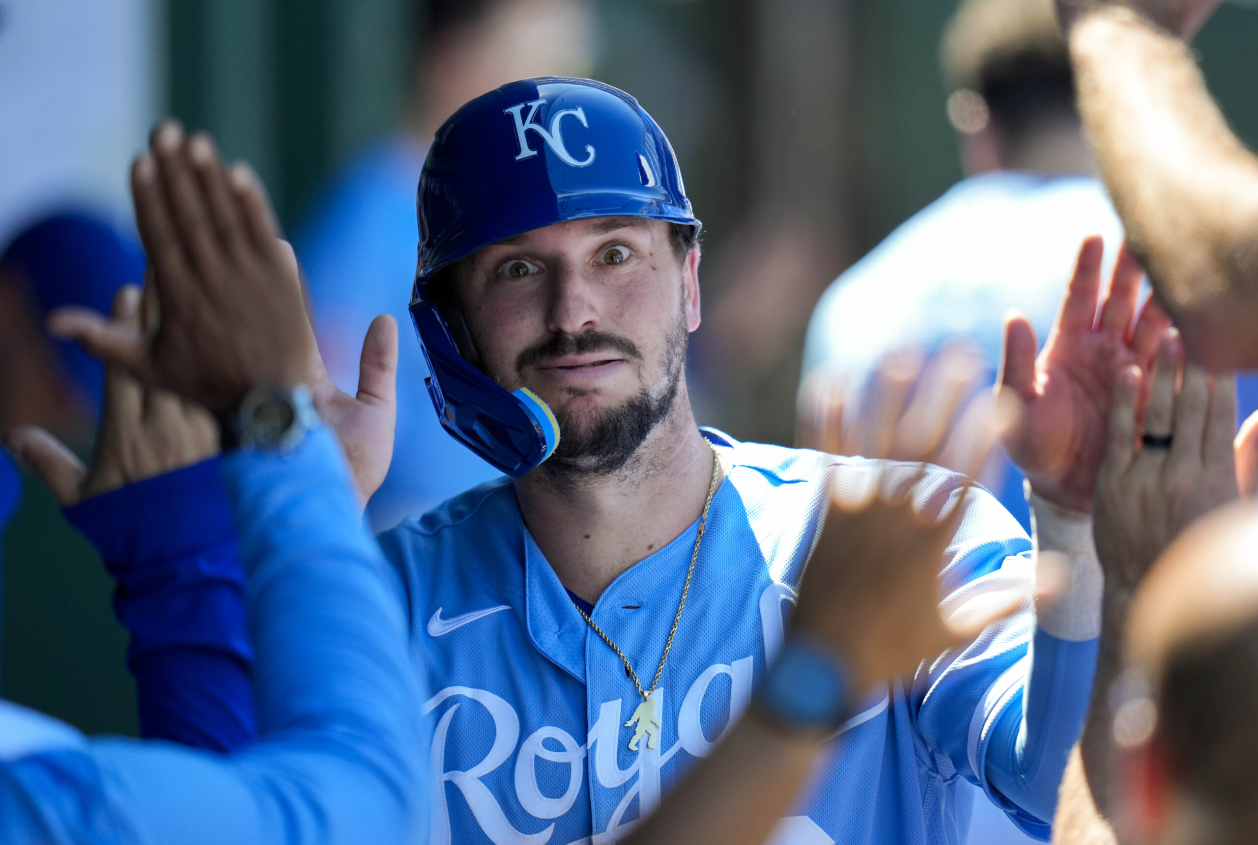 May 24, 2026; Kansas City, Missouri, USA; Kansas City Royals first baseman Vinnie Pasquantino (9) is congratulated by teammates after scoring a run during the seventh inning against the Seattle Mariners at Kauffman Stadium. Mandatory Credit: Jay Biggerstaff-Imagn Images