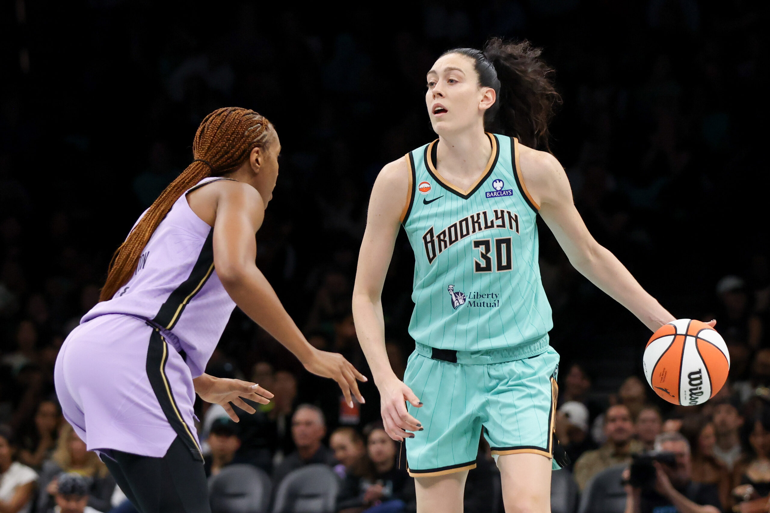 May 21, 2026; Brooklyn, New York, USA; New York Liberty forward Breanna Stewart (30) looks to pass against Golden State Valkyries forward Kayla Thornton (5) during the third quarter at Barclays Center. Mandatory Credit: Tom Horak-Imagn Images