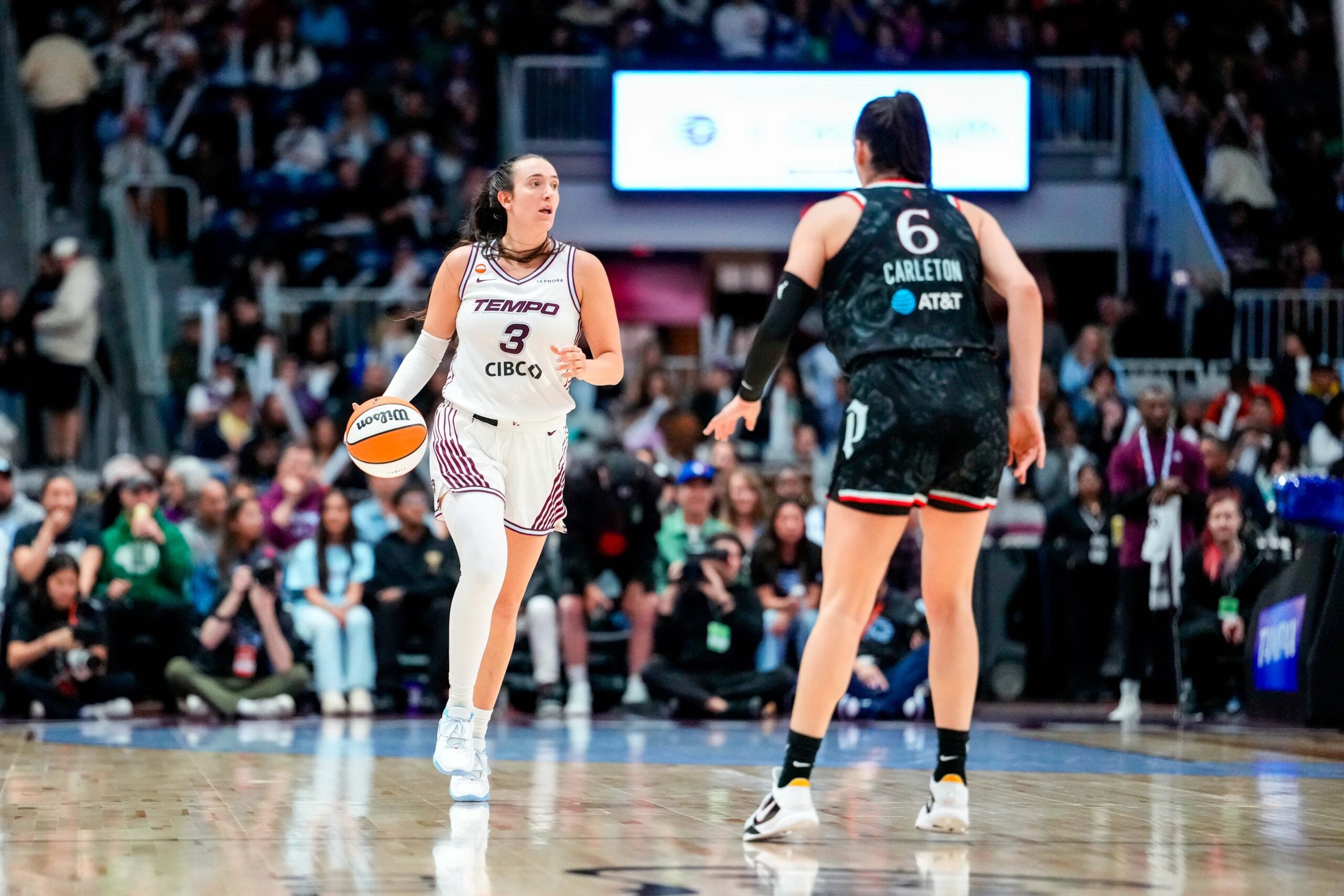 May 23, 2026; Toronto, Ontario, CAN;  Toronto Tempo guard Marina Mabrey (3) dribbles against Portland Fire forward Bridget Carleton (6) at Coca-Cola Coliseum. Mandatory Credit: Kevin Sousa-Imagn Images