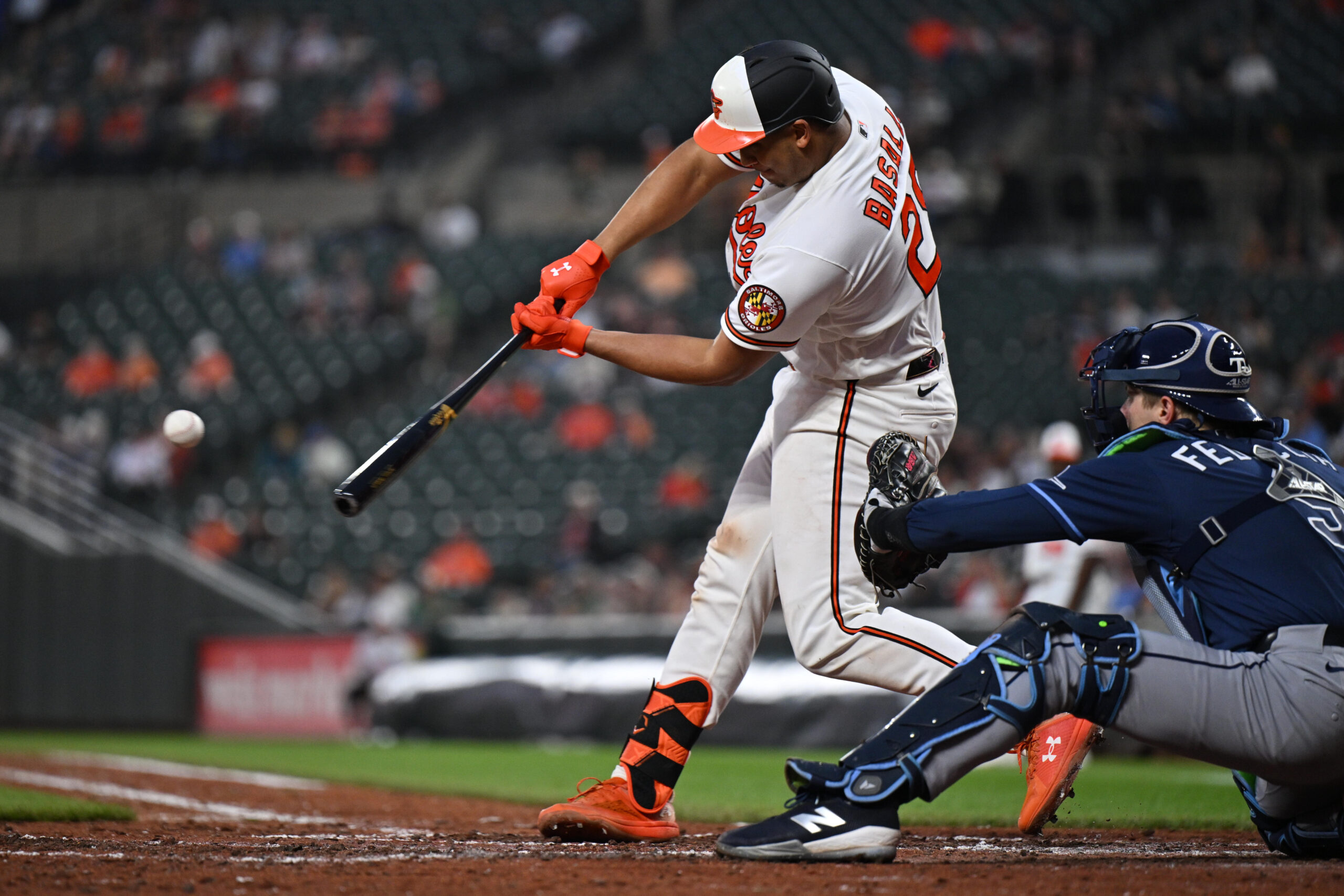 May 26, 2026; Baltimore, Maryland, USA;  Baltimore Orioles catcher Samuel Basallo (29) hits a three-run home run in the fifth inning against the Tampa Bay Rays at Oriole Park at Camden Yards. Mandatory Credit: Jamie Sabau-Imagn Images