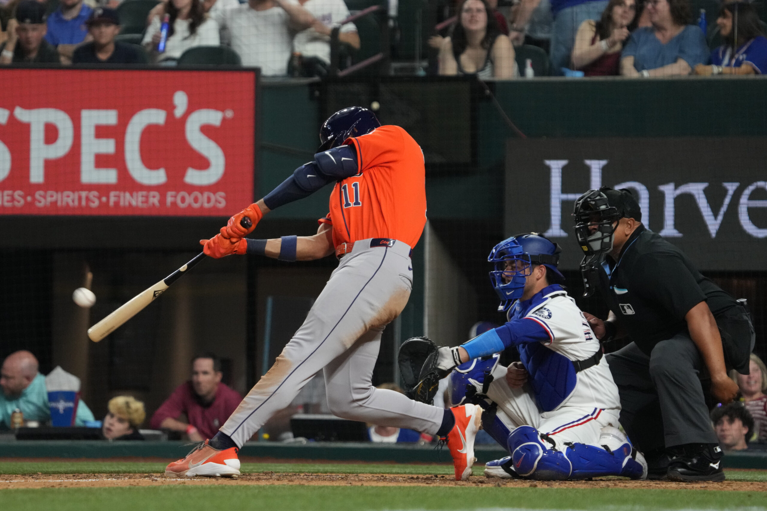 May 26, 2026; Arlington, Texas, USA; Houston Astros right fielder Cam Smith (11) hits a solo home run against the Texas Rangers during the eighth inning at Globe Life Field. Mandatory Credit: Raymond Carlin III-Imagn Images