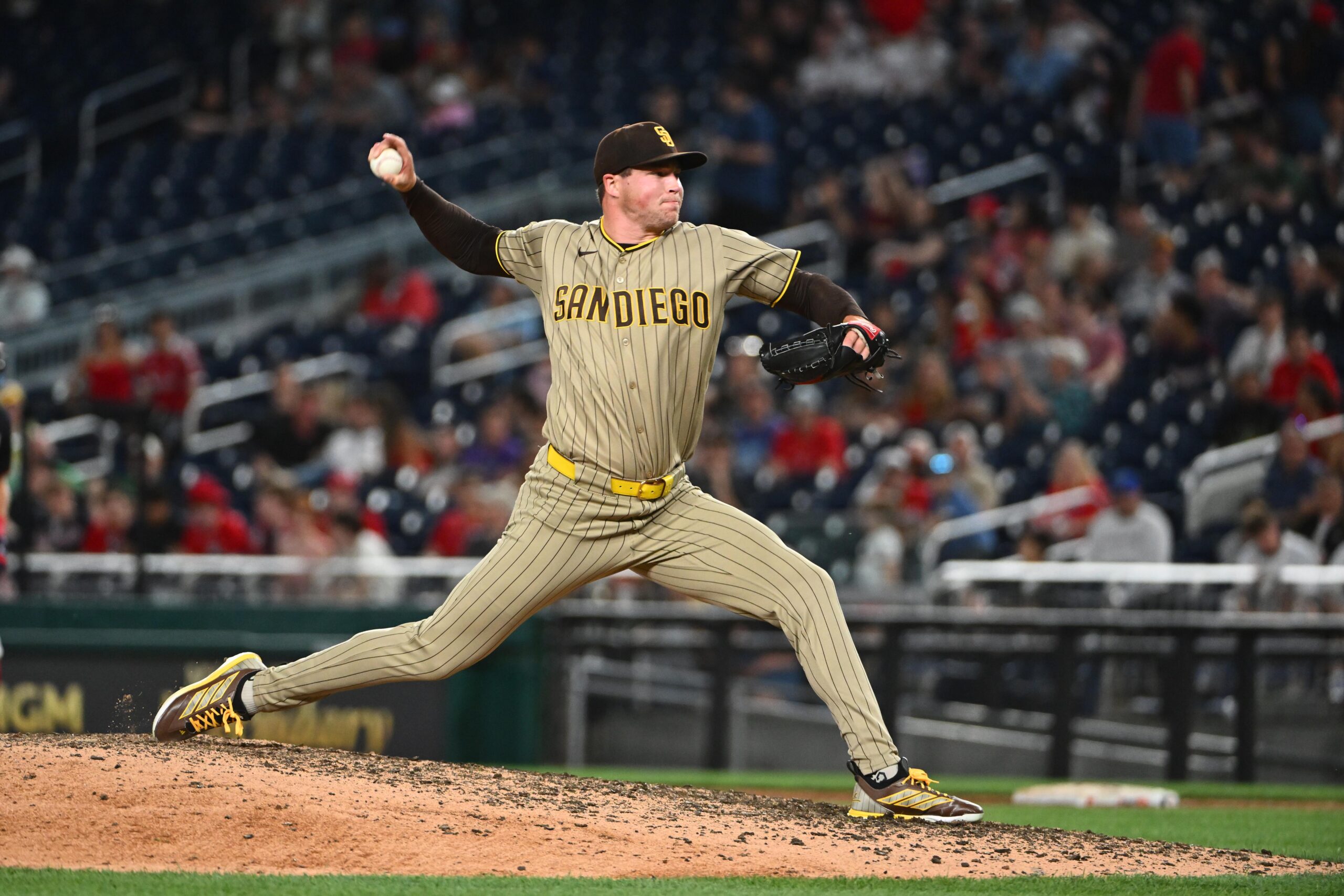 May 29, 2026; Washington, District of Columbia, USA; San Diego Padres pitcher Mason Miller (22) throws to the Washington Nationals during the ninth inning at Nationals Park. Mandatory Credit: Brad Mills-Imagn Images