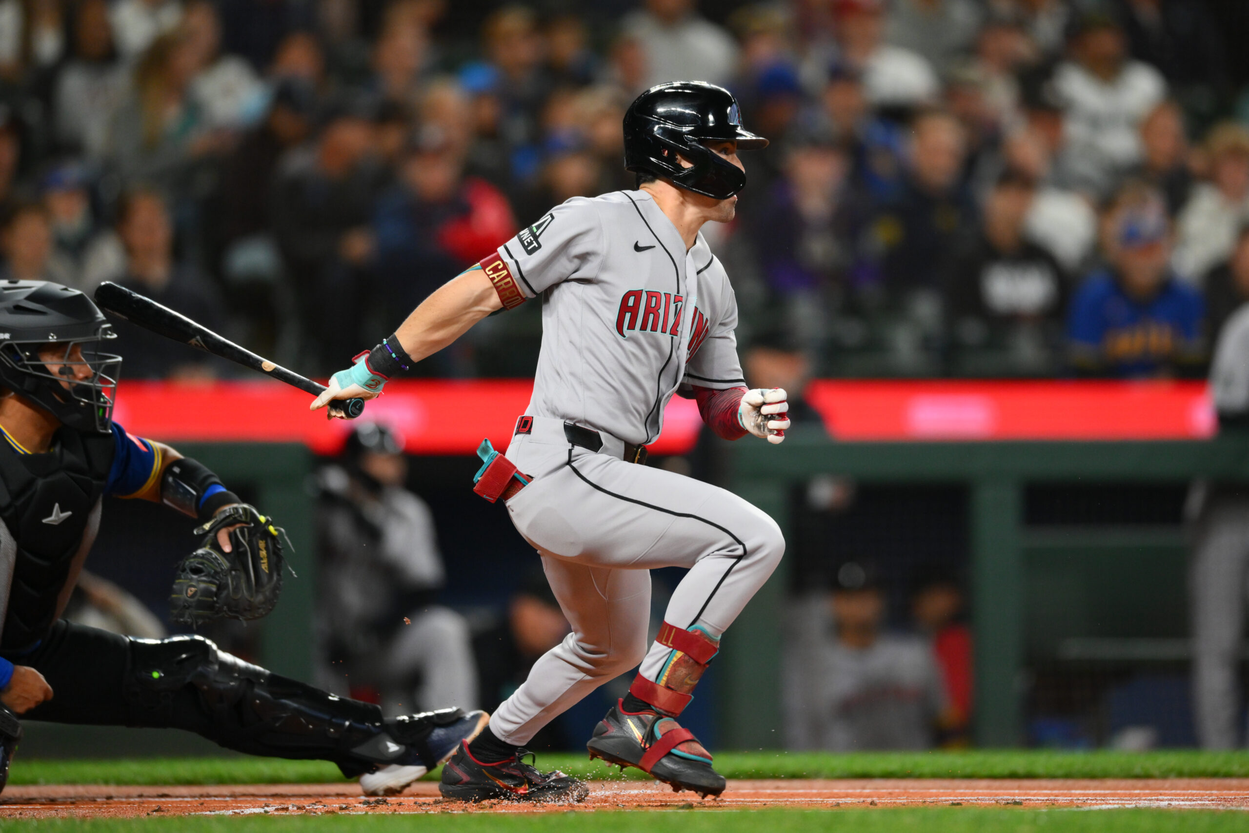 May 29, 2026; Seattle, Washington, USA; Arizona Diamondbacks right fielder Corbin Carroll (7) hits a single against the Seattle Mariners during the first inning at T-Mobile Park. Mandatory Credit: Steven Bisig-Imagn Images