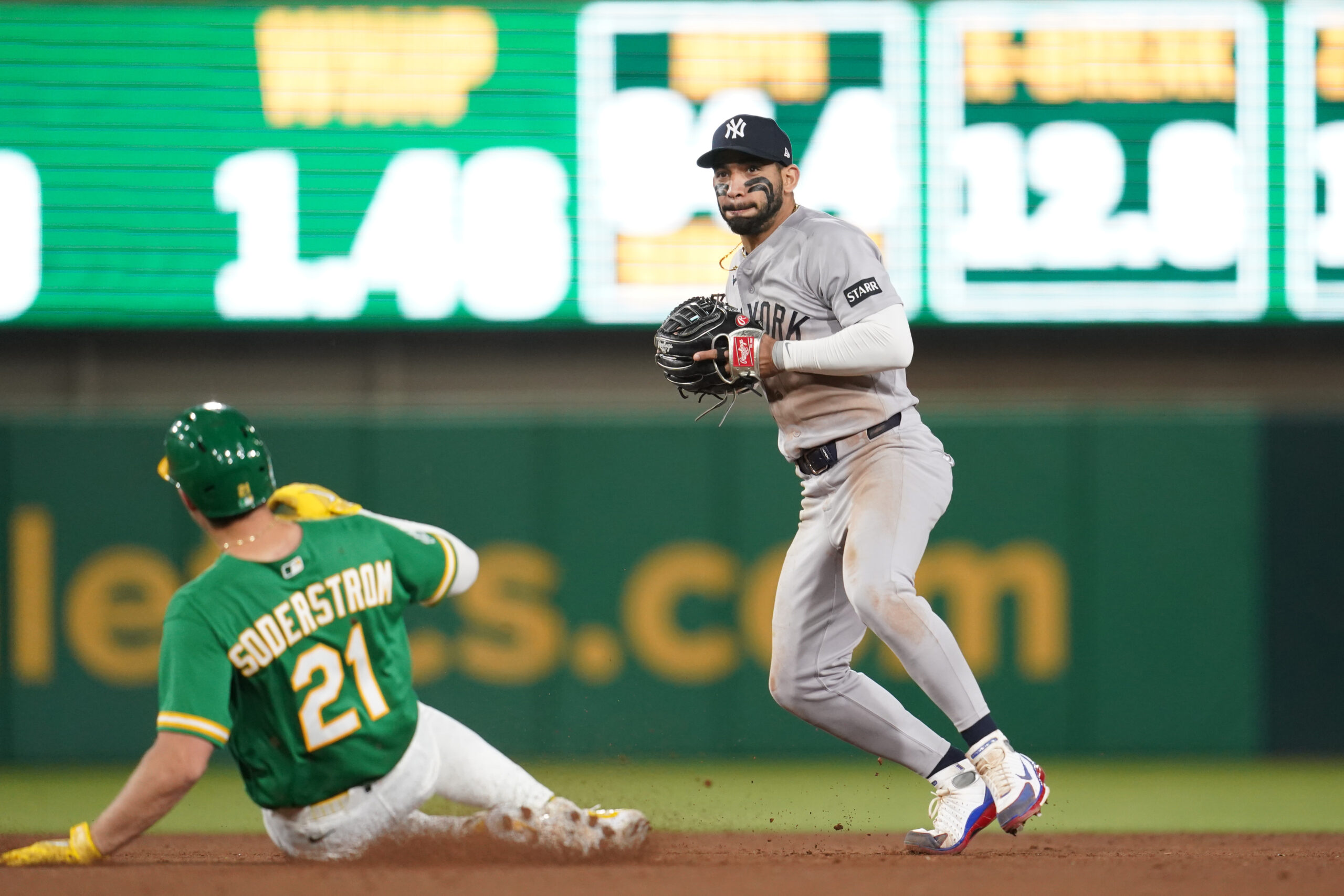 May 29, 2026; West Sacramento, California, USA; New York Yankees shortstop Jose Caballero (72) holds onto the ball after forcing out Athletics left fielder Tyler Soderstrom (21) at second base in the ninth inning at Sutter Health Park. Mandatory Credit: Cary Edmondson-Imagn Images