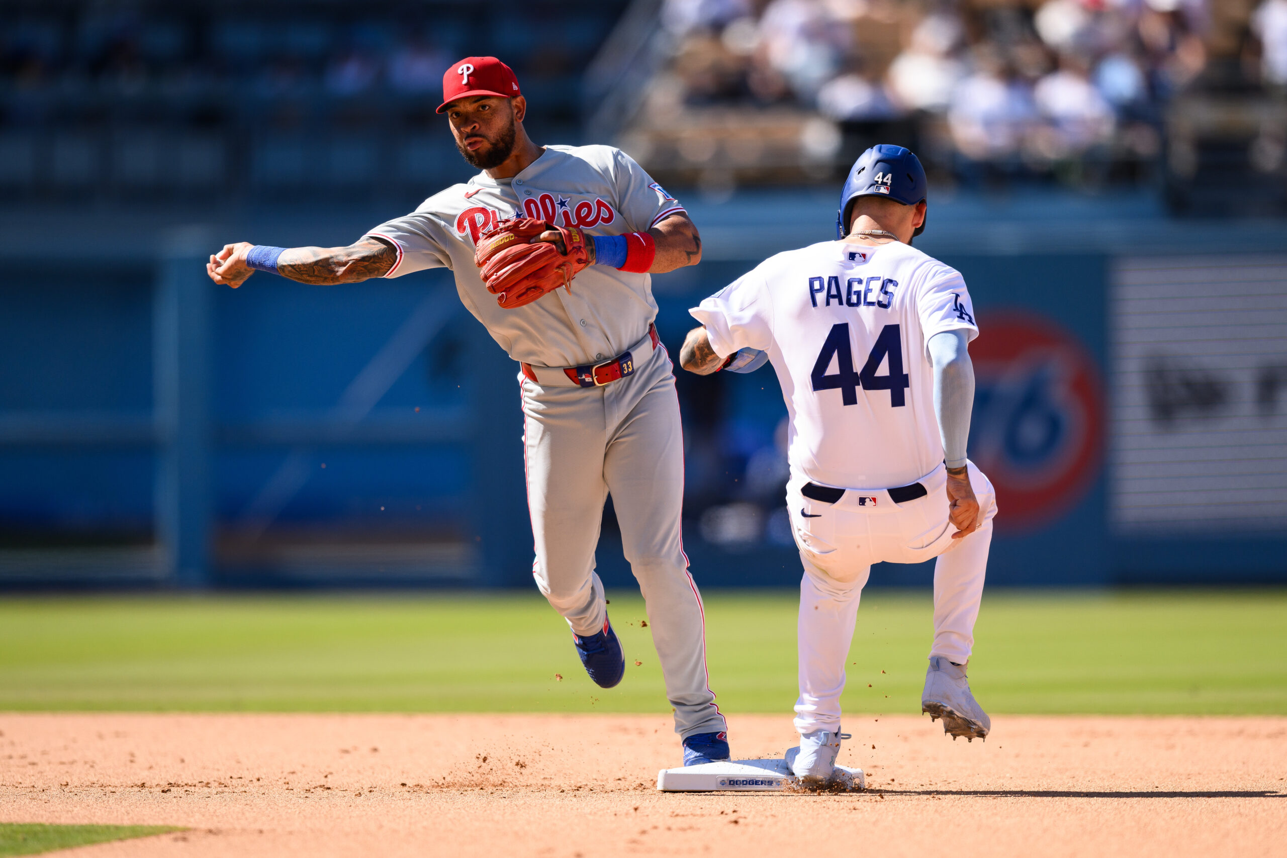 May 31, 2026; Los Angeles, California, USA; Philadelphia Phillies second baseman Edmundo Sosa (33) throws after forcing out Los Angeles Dodgers center fielder Andy Pages (44) during the eighth inning at Dodger Stadium. Mandatory Credit: William Liang-Imagn Images