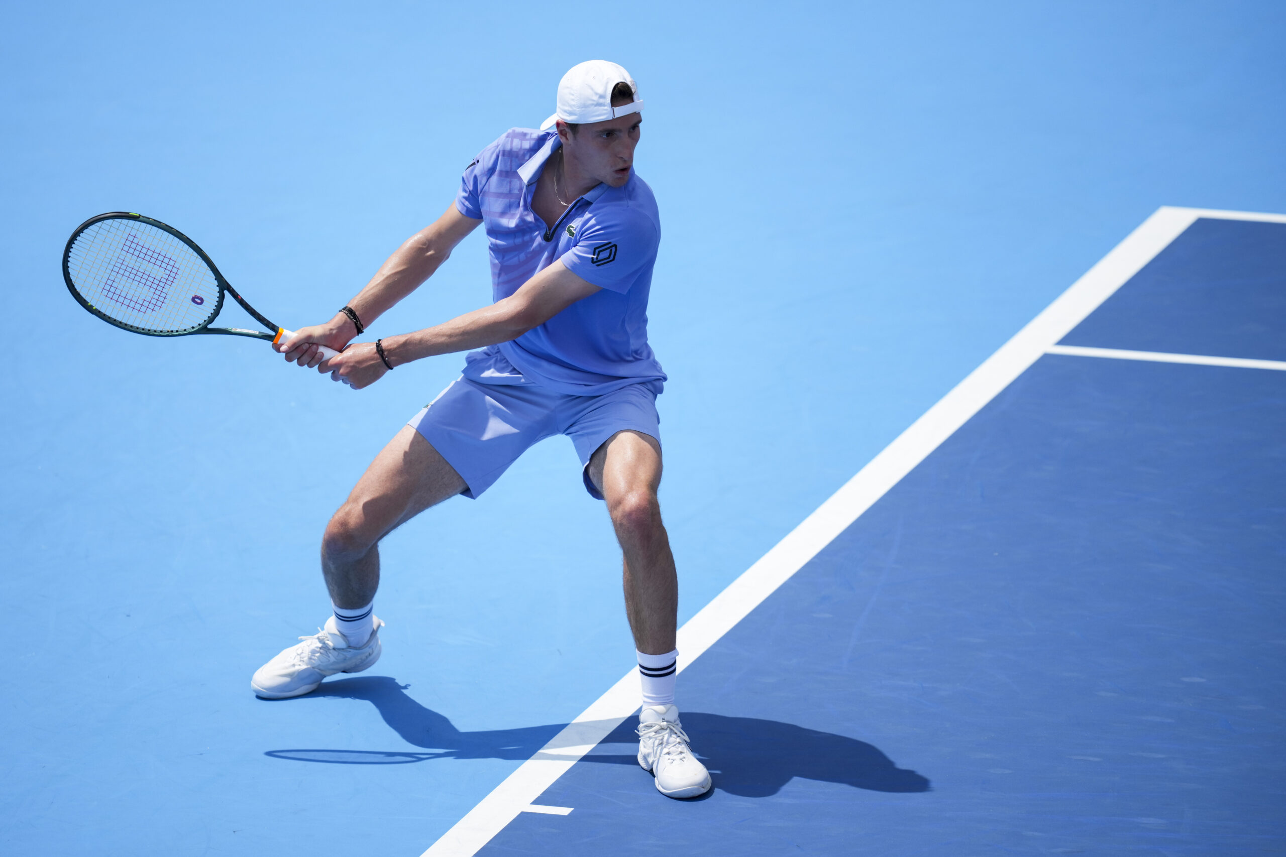Aug 11, 2025; Cincinnati, OH, USA; Ugo Humbert (FRA) returns a shot against Frances Tiafoe (USA) during the Cincinnati Open at the Lindner Family Tennis Center. Mandatory Credit: Aaron Doster-Imagn Images