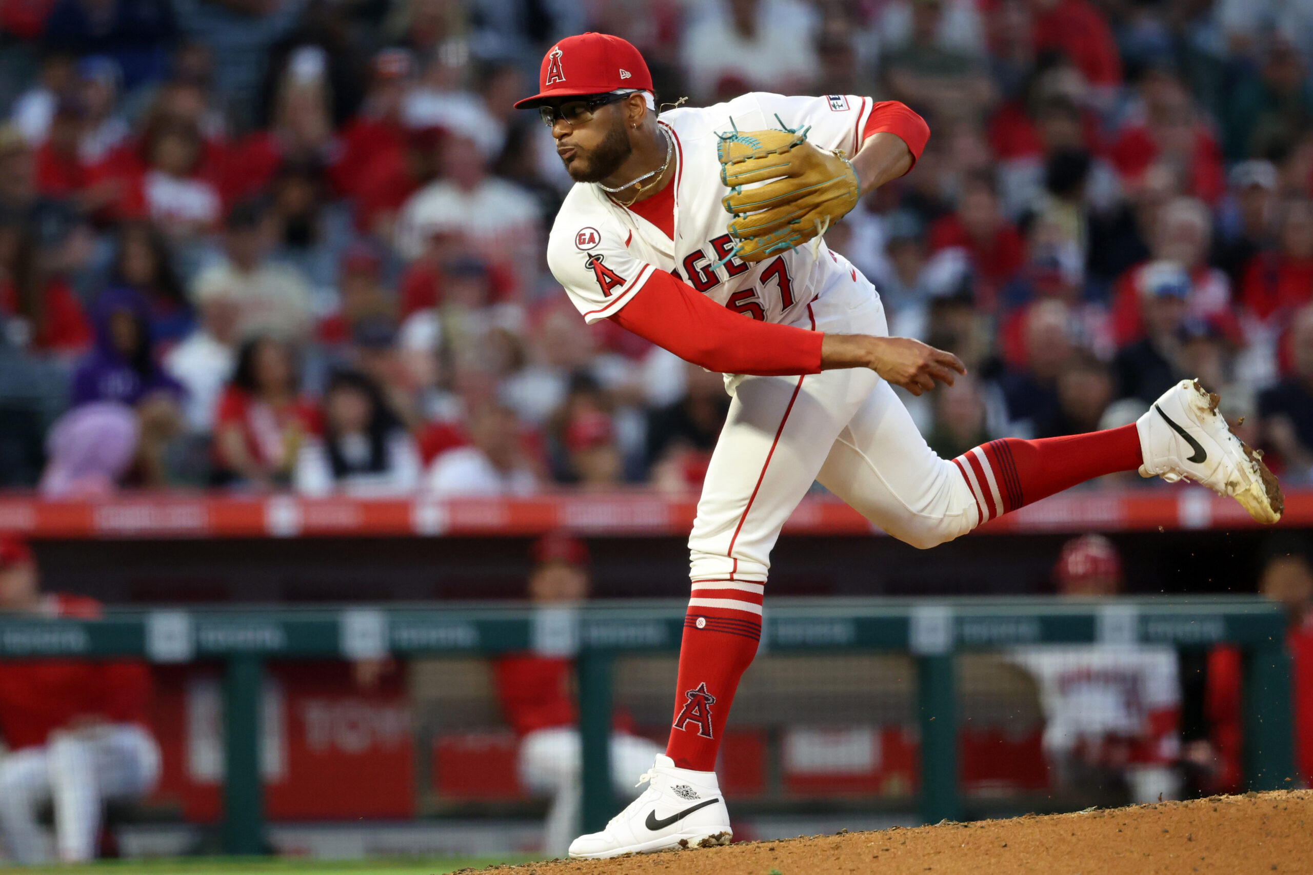 May 23, 2026; Anaheim, California, USA; Los Angeles Angels pitcher Walbert Urena (57) pitches during the third inning against the Texas Rangers at Angel Stadium. Mandatory Credit: Kiyoshi Mio-Imagn Images