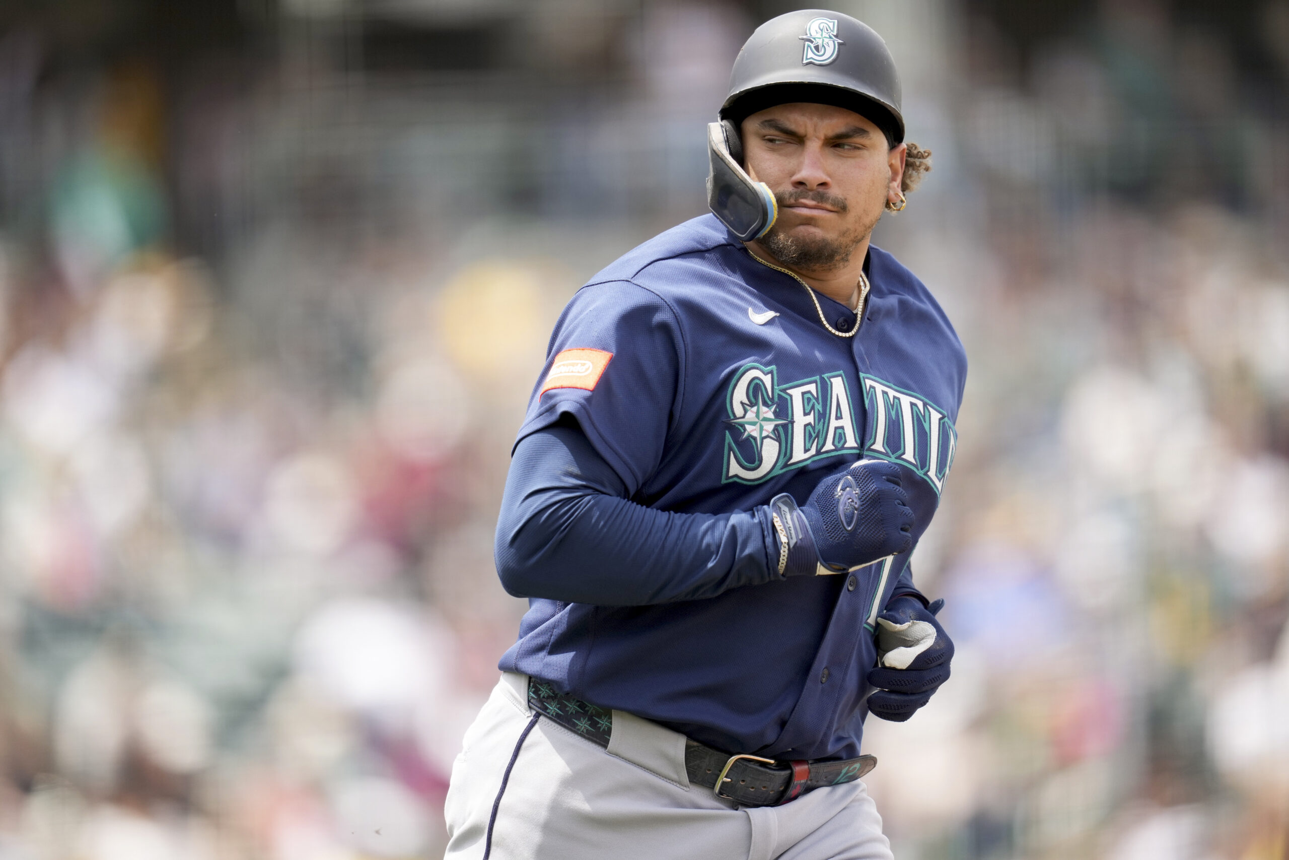 May 27, 2026; West Sacramento, California, USA; Seattle Mariners first baseman Josh Naylor (12) looks towards the dugout after hitting a single against the Athletics in the seventh inning at Sutter Health Park. Mandatory Credit: Cary Edmondson-Imagn Images