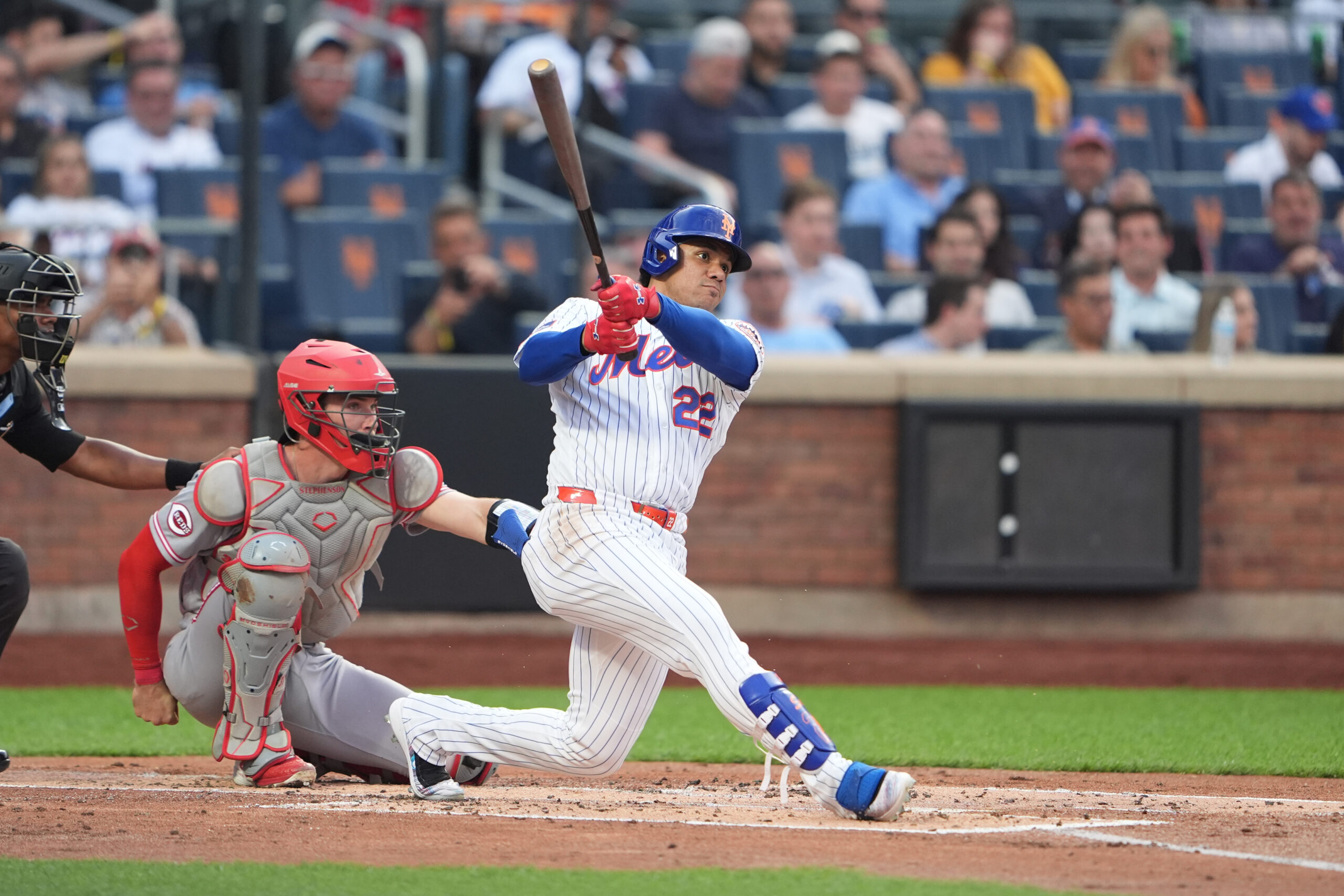May 27, 2026; New York City, New York, USA; New York Mets left fielder Juan Soto (22) hits a home run against the Cincinnati Reds during the first inning at Citi Field. Mandatory Credit: Gregory Fisher-Imagn Images