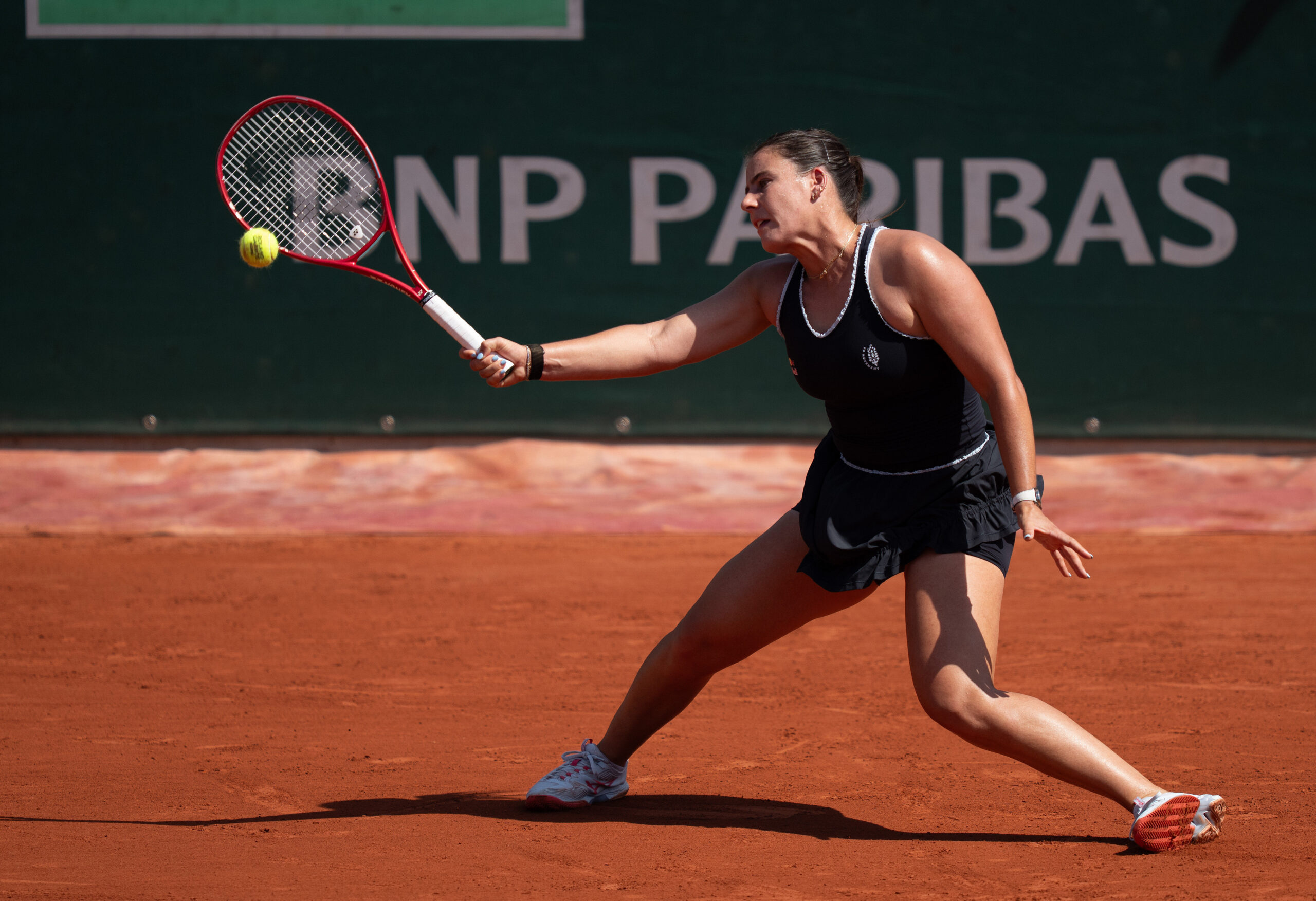 May 28, 2026; Paris, France; Emma Navarro of the United States returns a shot during her match against Iva Jovic of the United States on day five at Stade Roland Garros. Mandatory Credit: Susan Mullane-Imagn Images