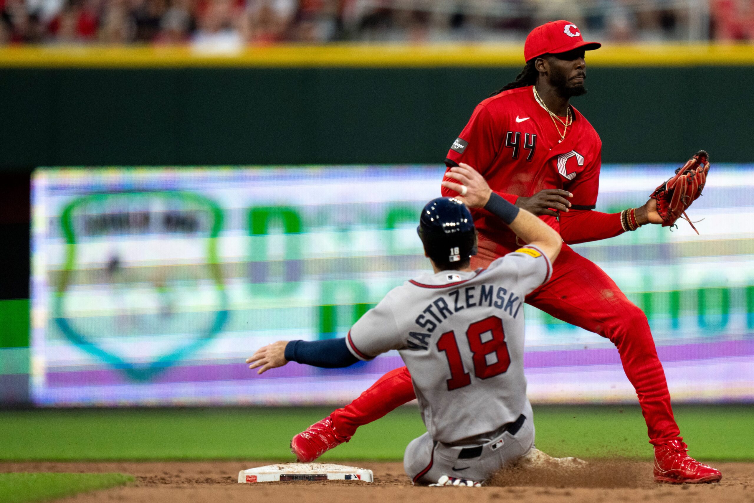 Cincinnati Reds shortstop Elly De La Cruz (44) catches the throw to get Atlanta Braves left fielder Mike Yastrzemski (18) out at second base in the sixth inning between the Atlanta Braves and Cincinnati Reds at Great American Ball Park in Cincinnati on Saturday, May 30, 2026.