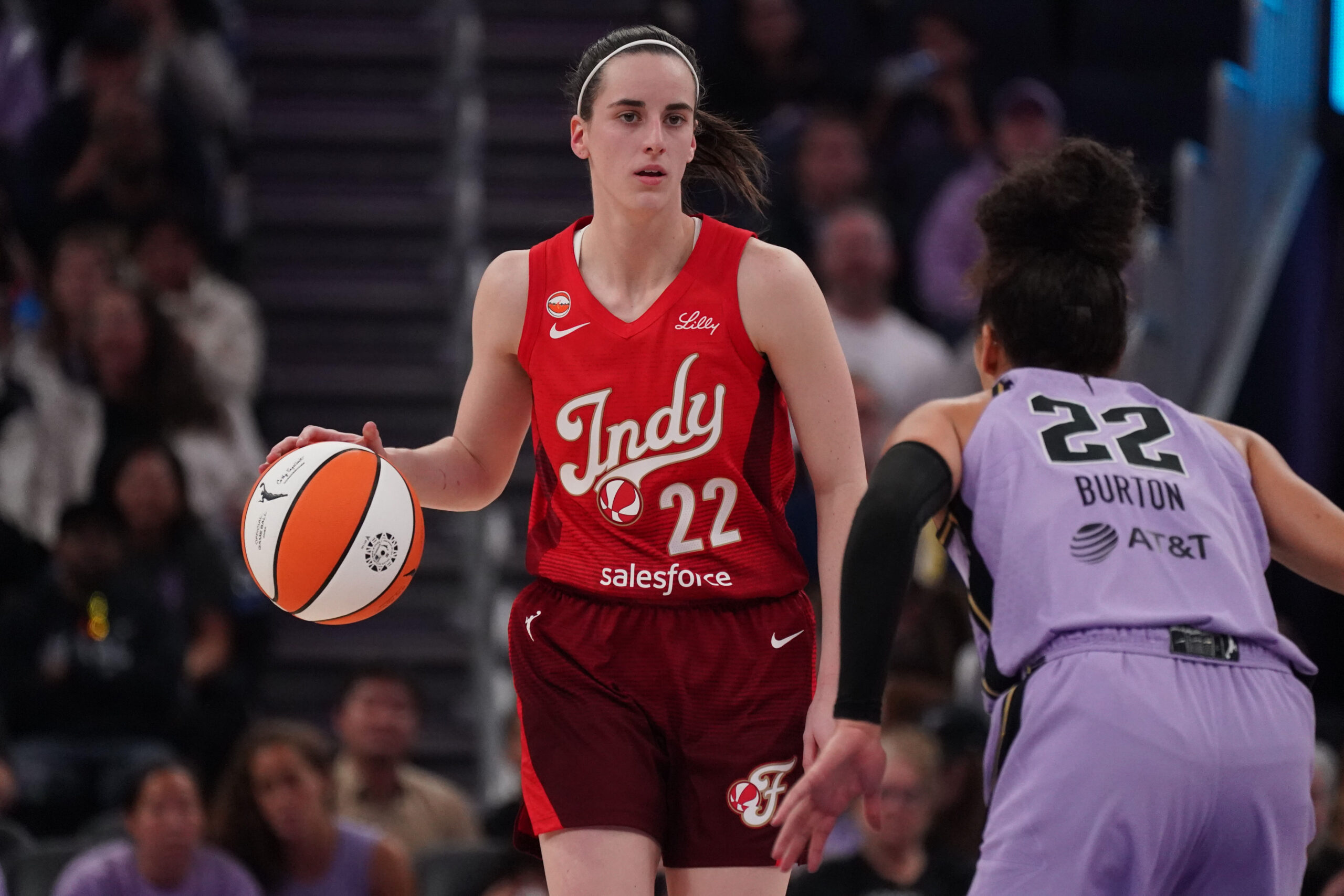May 28, 2026; San Francisco, California, USA;  Indiana Fever guard Caitlin Clark (22) dribbles while defended by Golden State Valkyries guard Veronica Burton (22) in the second quarter at Chase Center. Mandatory Credit: David Gonzales-Imagn Images
