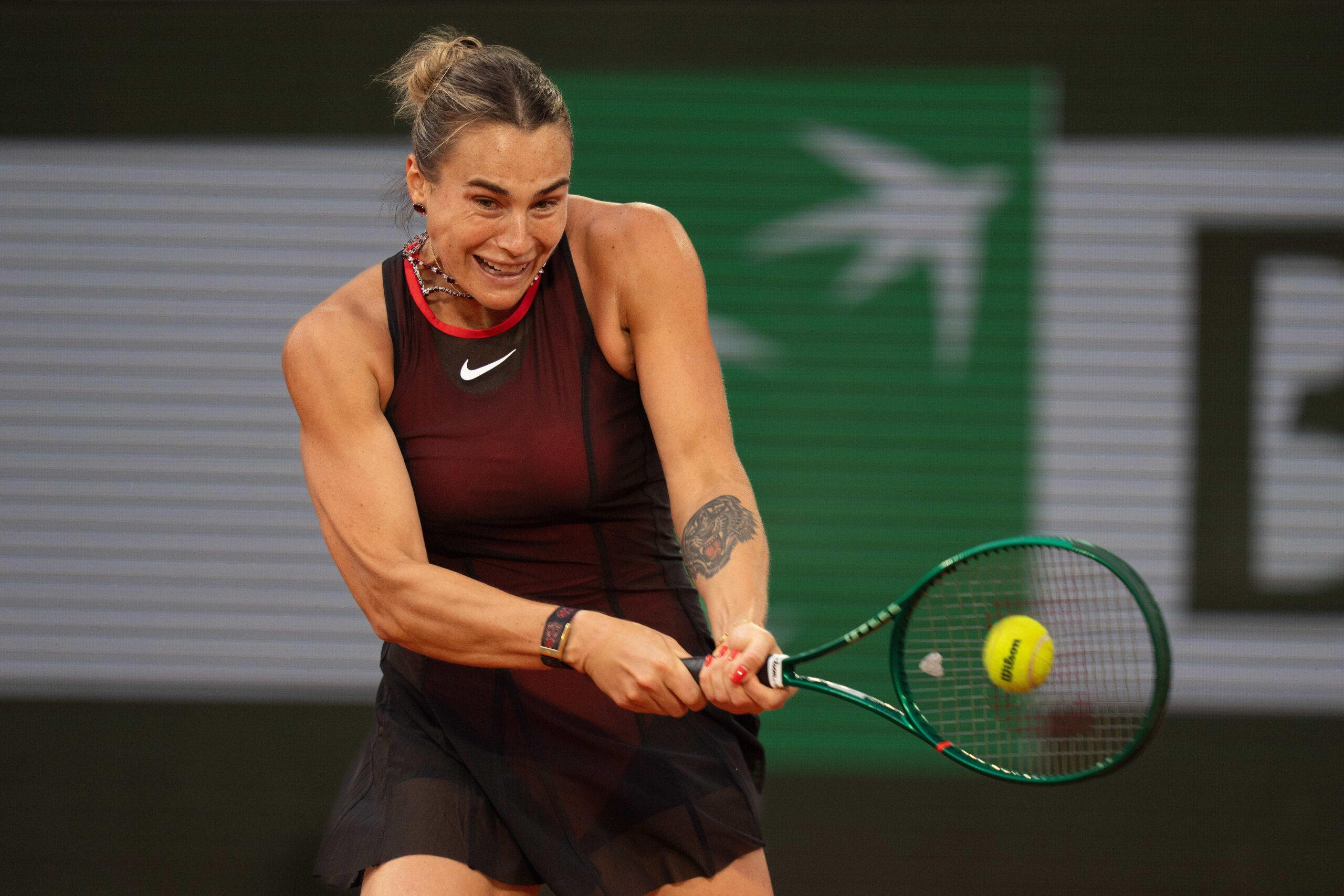 Jun 1, 2026; Paris, France;  Aryna Sabalenka returns a shot during her match against Naomi Osaka of Japan on day nine at Stade Roland Garros. Mandatory Credit: Susan Mullane-Imagn Images